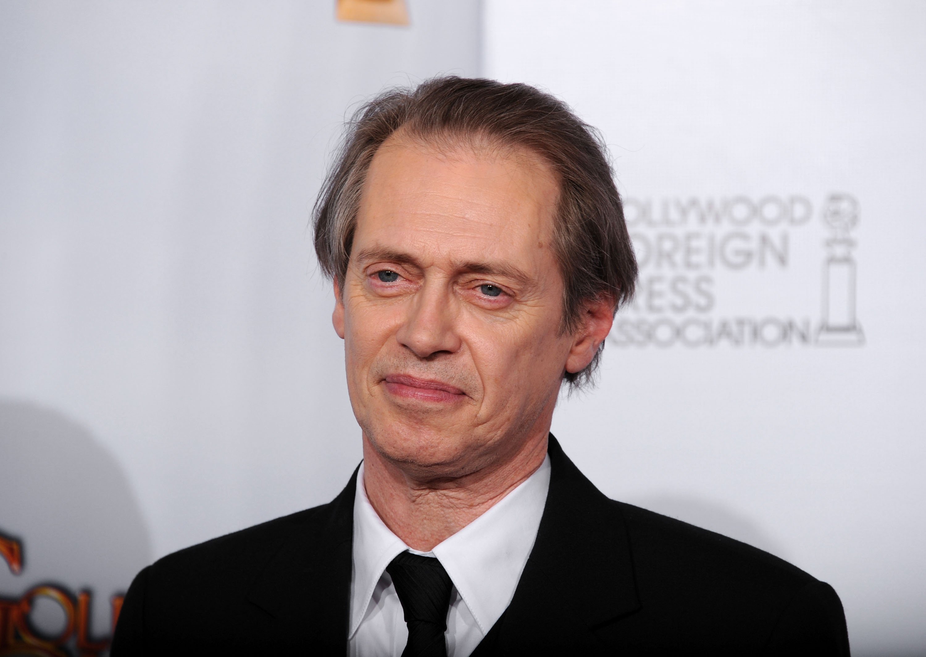 Steve Buscemi poses with his award for Best Actor in a Television Series (Drama) for "Boardwalk Empire" in the press room at the 68th Annual Golden Globe Awards