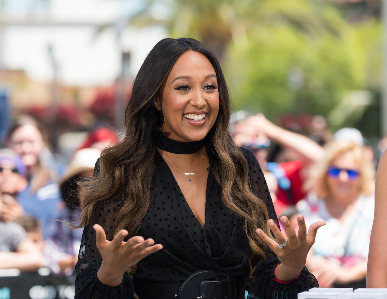 Tamera Mowry-Housley visits "Extra" at Universal Studios Hollywood