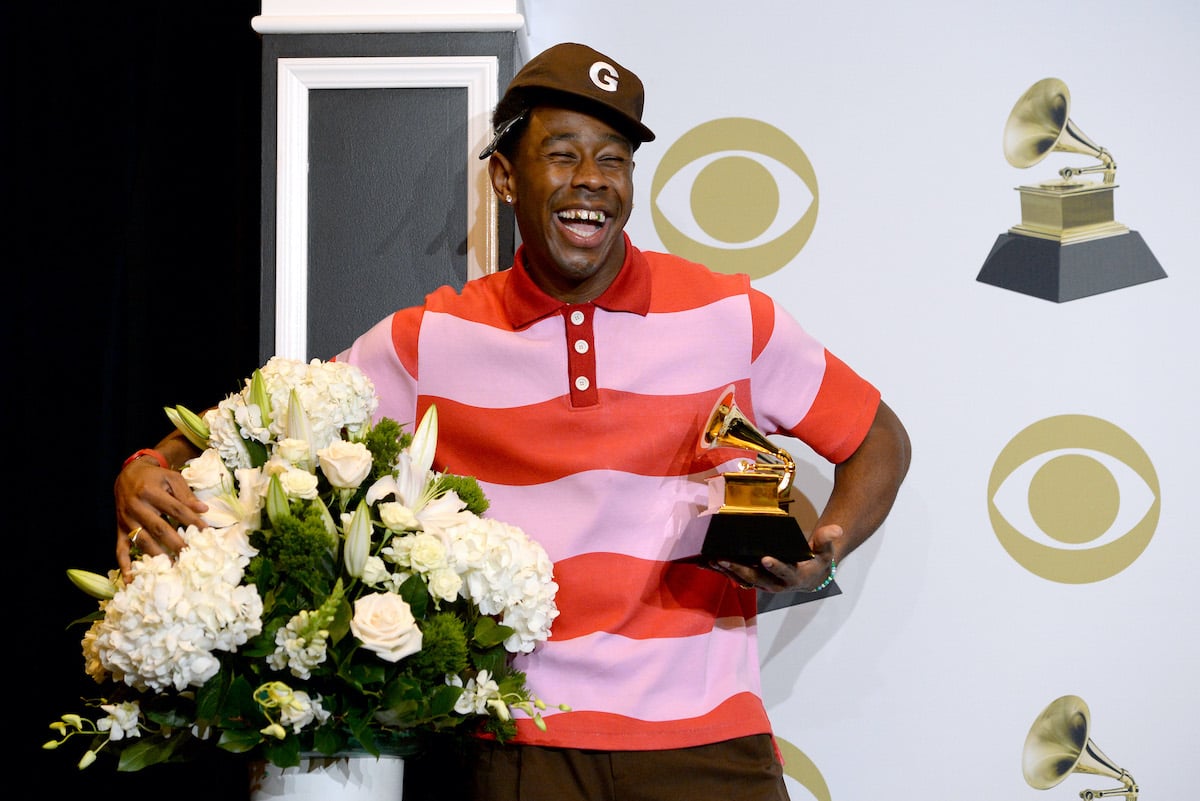 Tyler, the Creator poses in the press room with the award for Best Rap Album for Igor during the 62nd Annual GRAMMY Awards