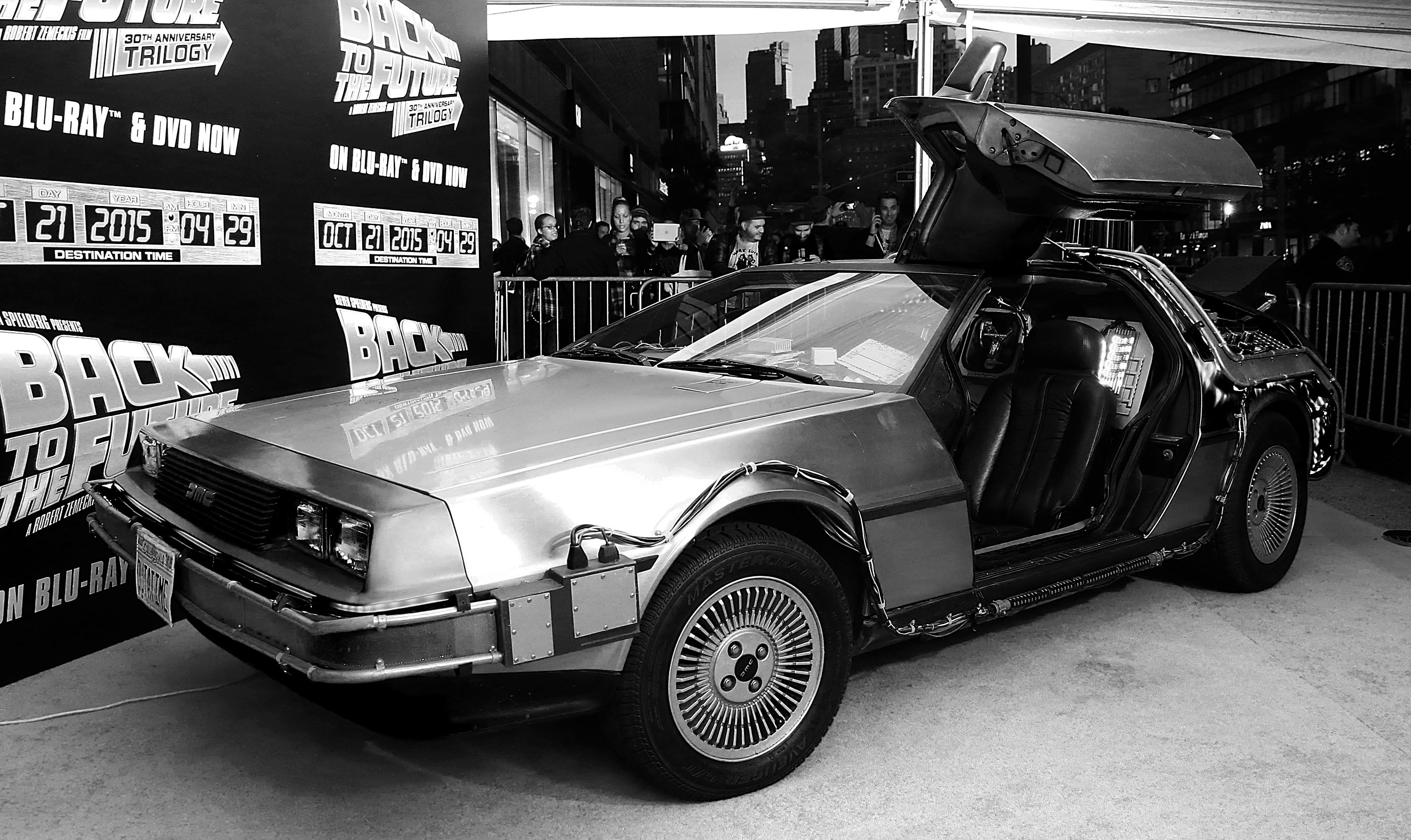 A DeLorean near the Back to the Future logo