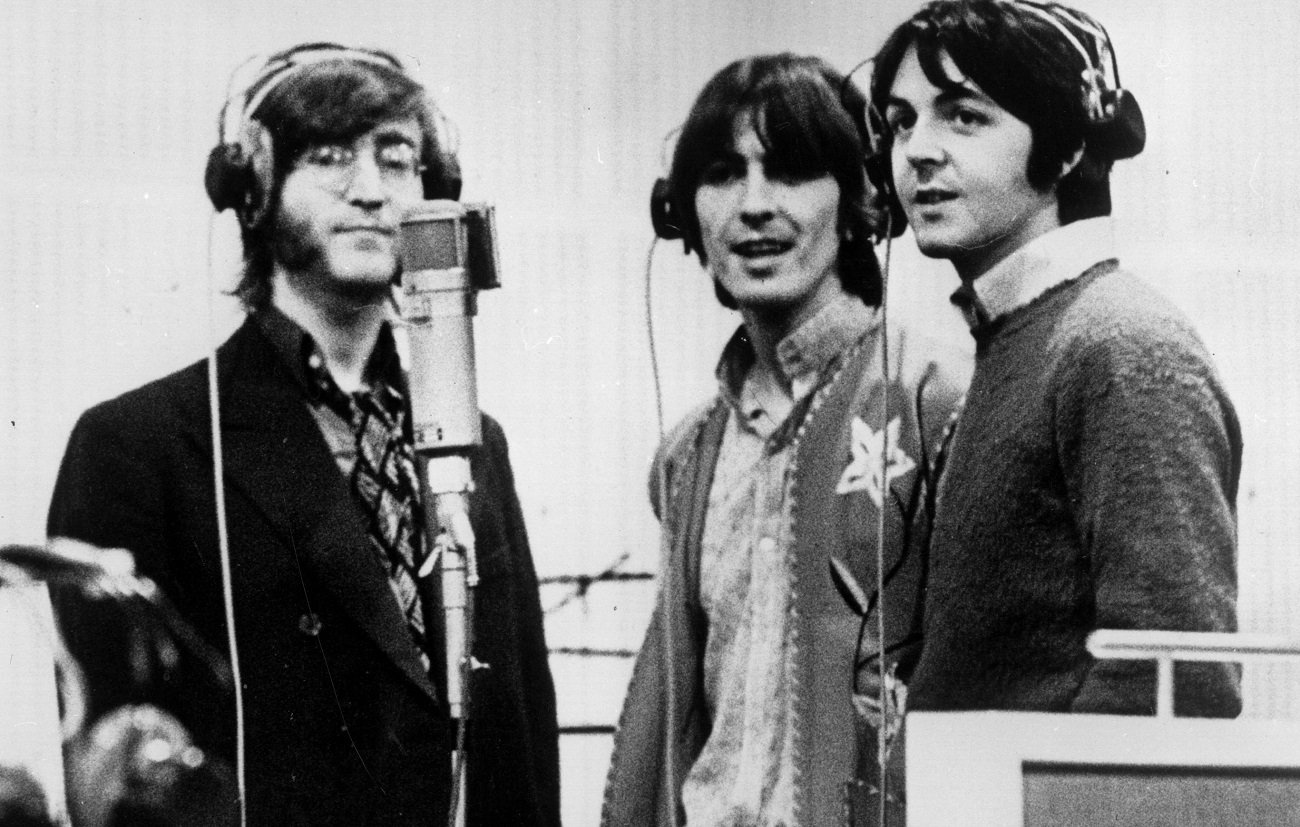 John Lennon at the mic with The Beatles