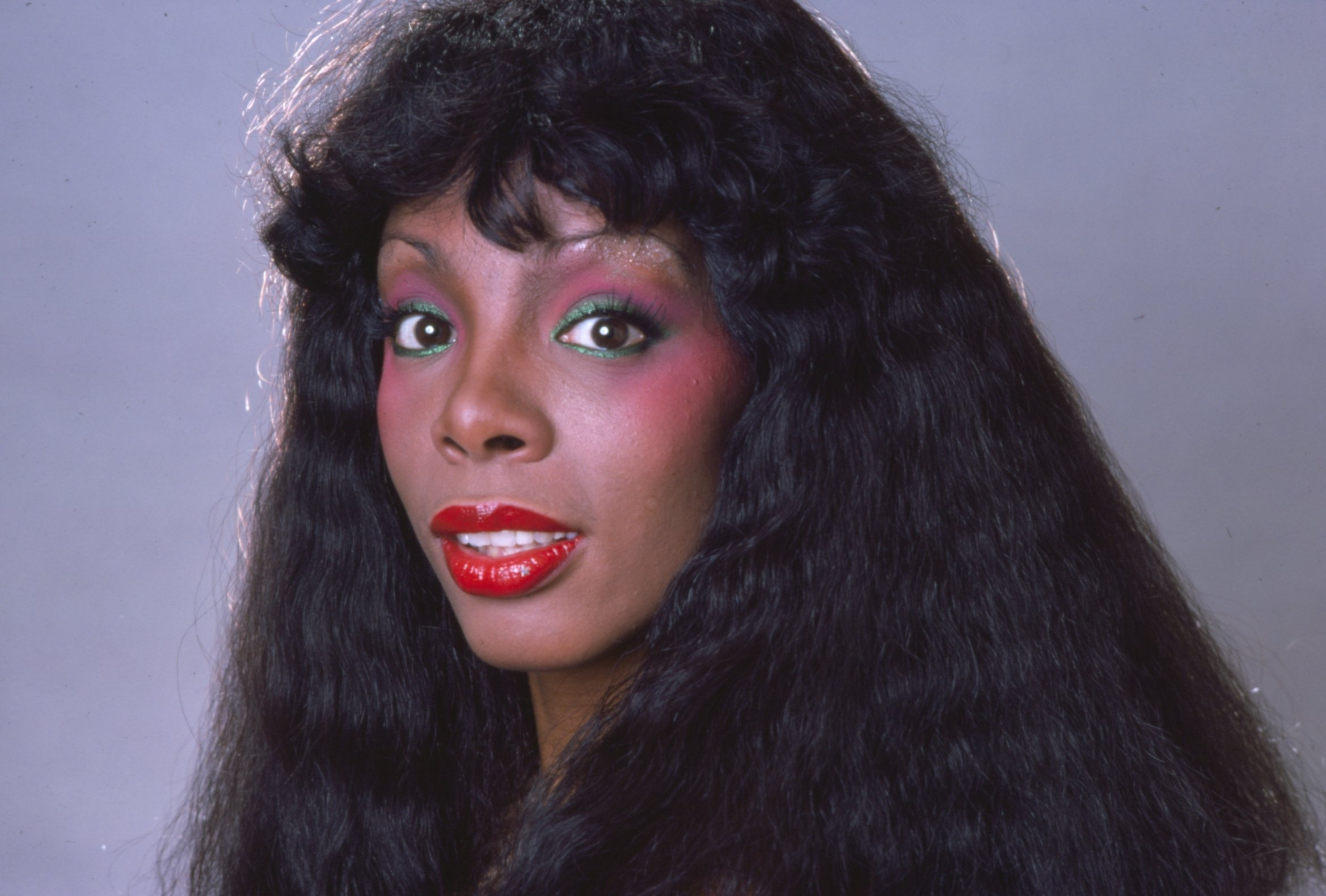 Donna Summer wearing red lipstick