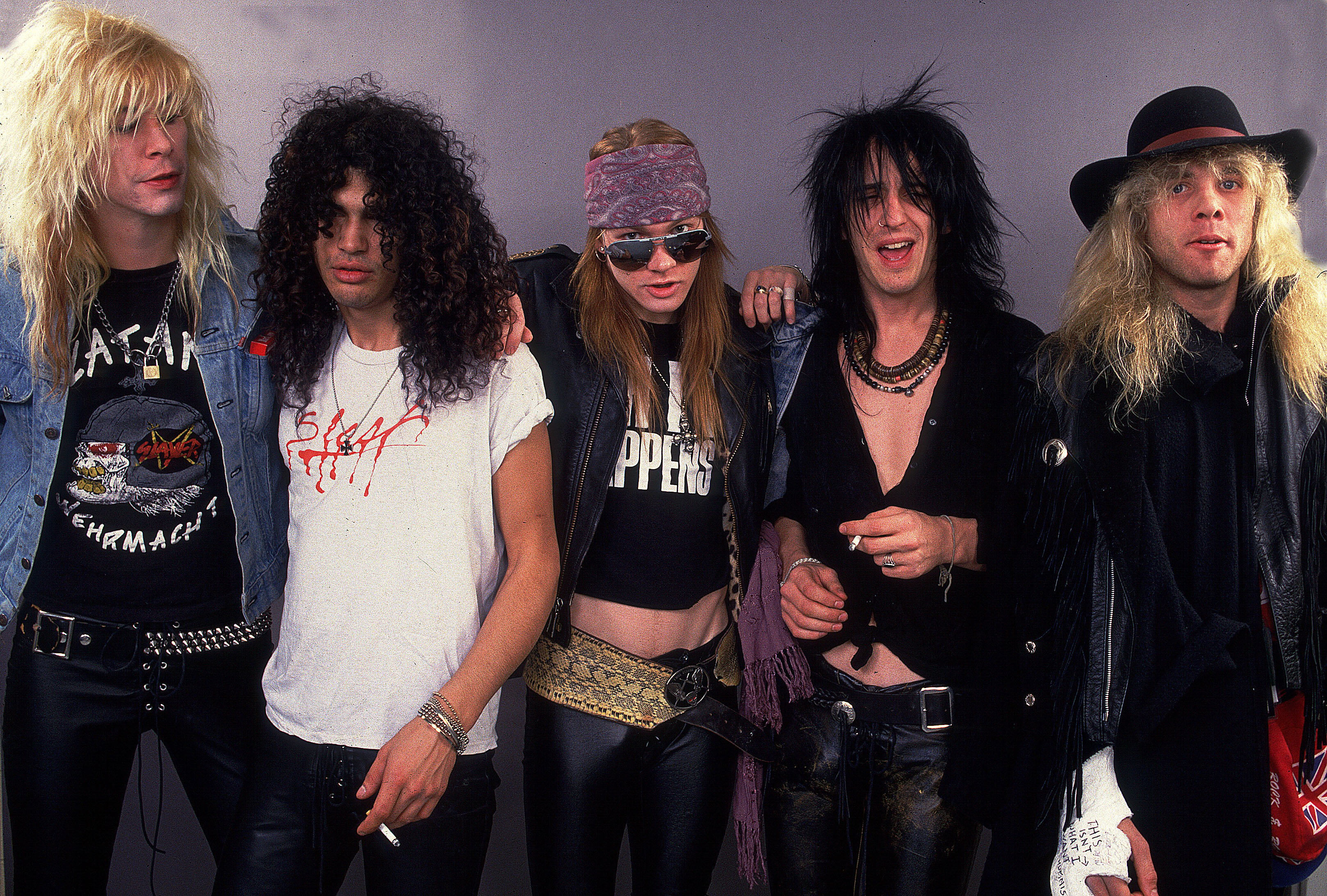 The members of Guns 'N Roses standing in a row