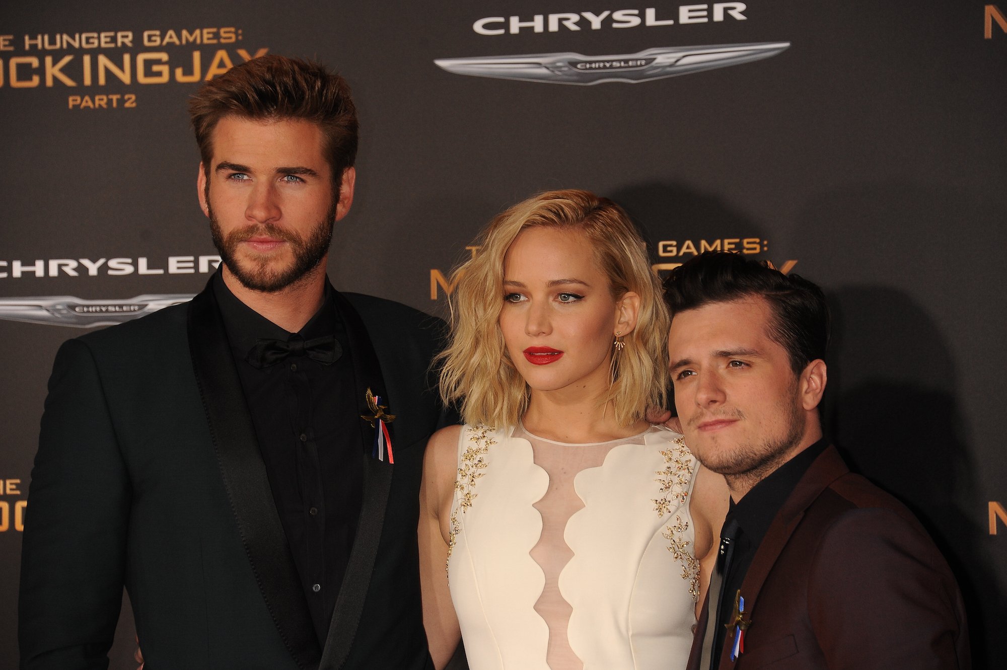 Liam Hemsworth, Jennifer Lawrence, and Josh Hutcherson at the premiere of 'The Hunger Games: Mockingjay - Part 2' at the Microsoft Theater.