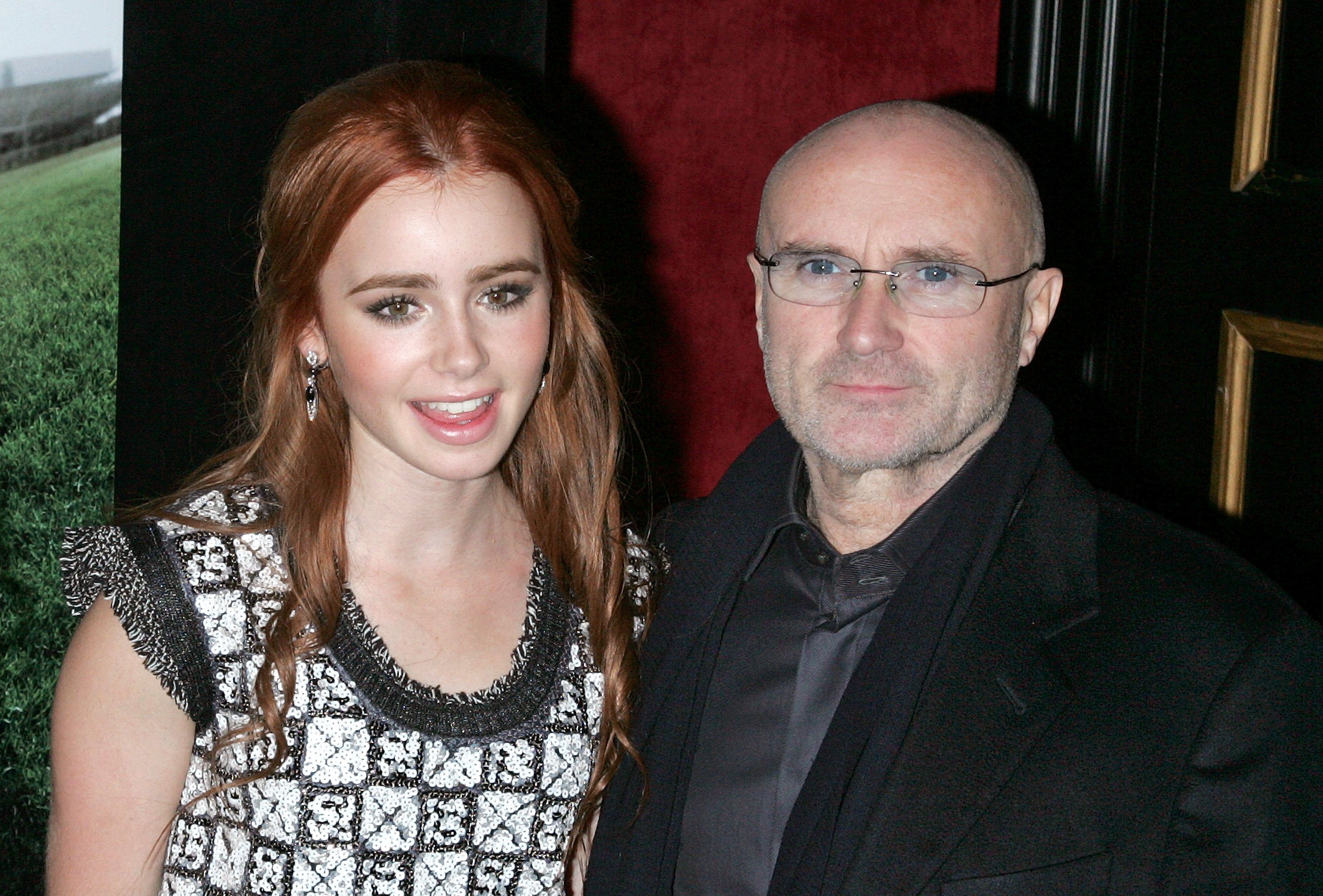Lily Collins and Phil Collins attend 'The Blind Side' premiere on November 17, 2009 in New York City.