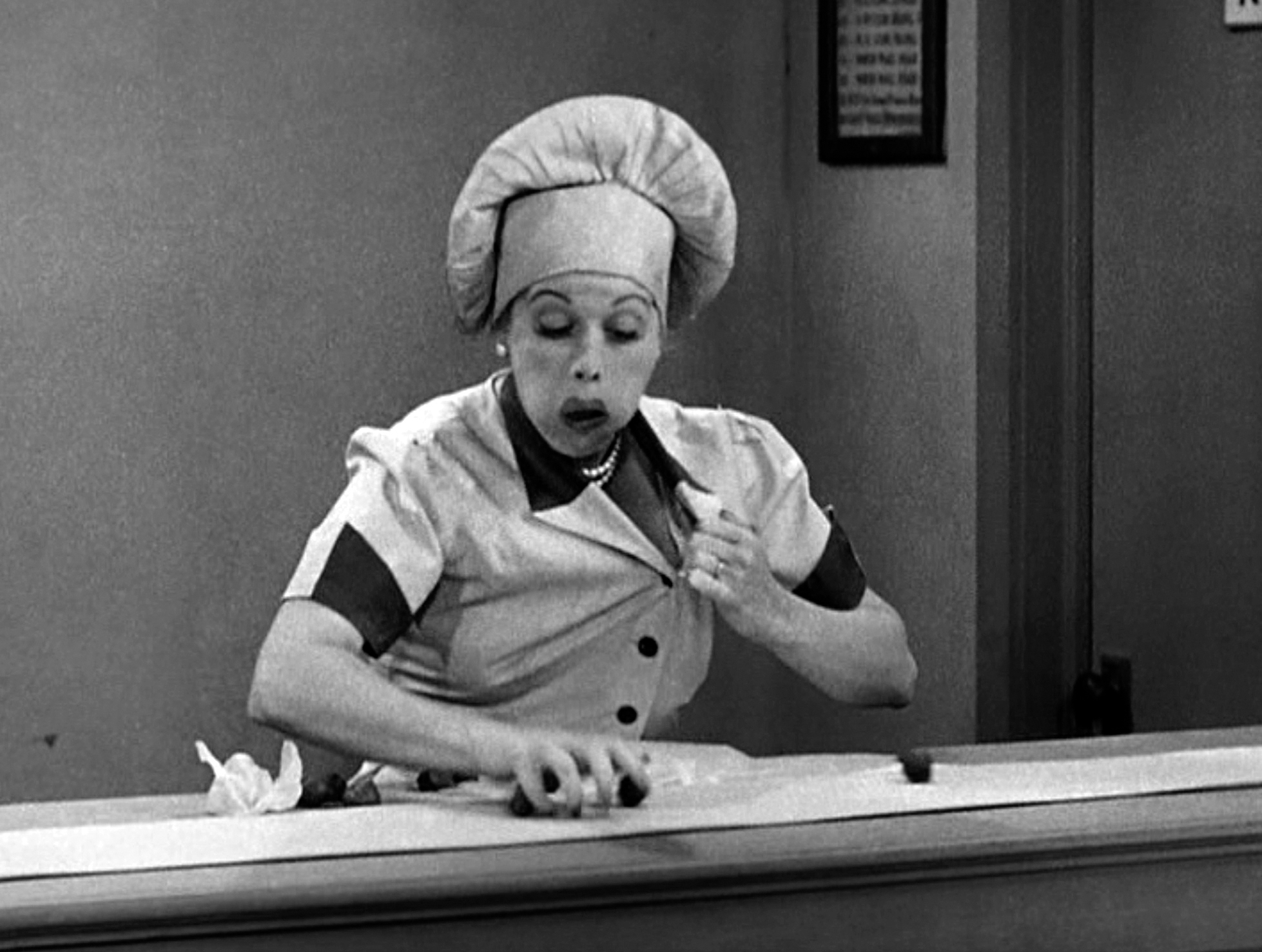 Lucille Ball wearing a hat in an episode of I Love Lucy
