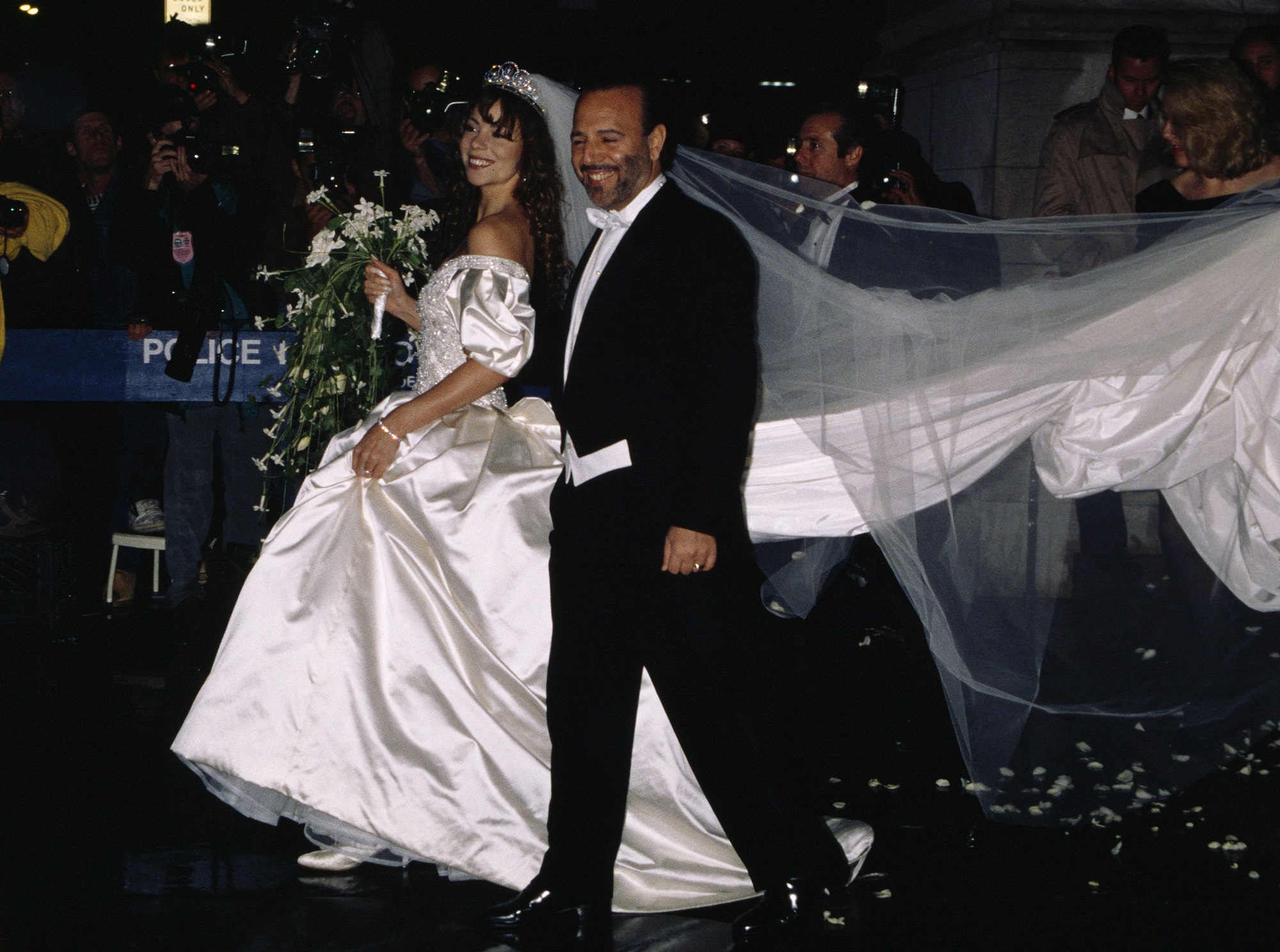 Singer Mariah Carey and husband, Sony Music president Tommy Mottola after their marriage at St. Thomas Episcopal Church in Manhattan. 