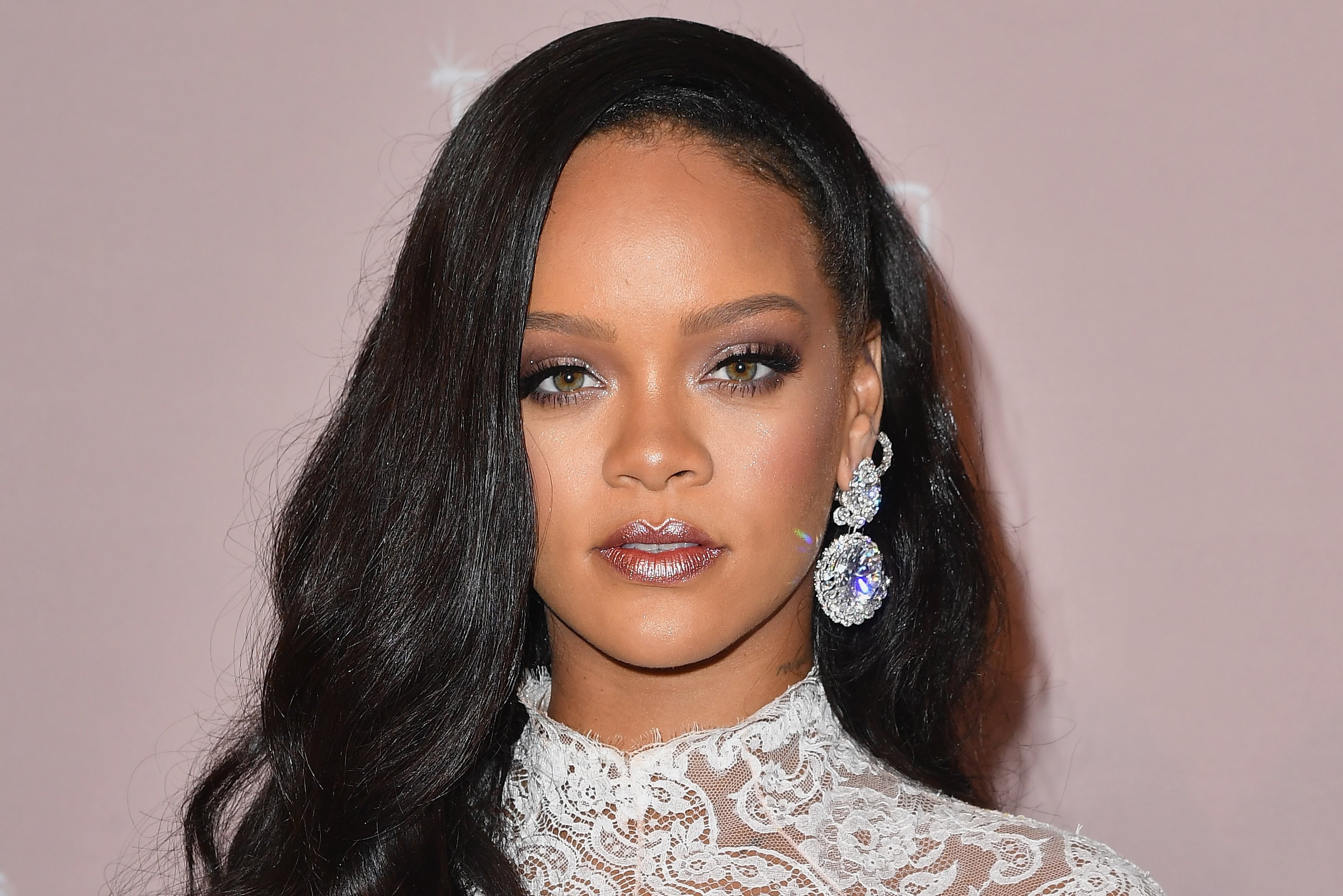 Rihanna wearing a diamond earring