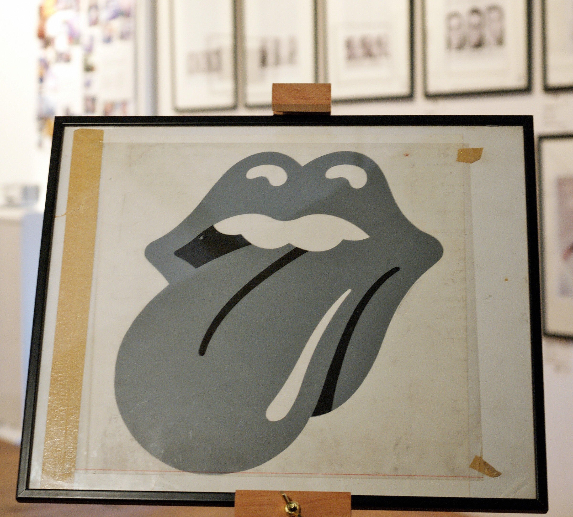 A framed image of The Rolling Stones' logo