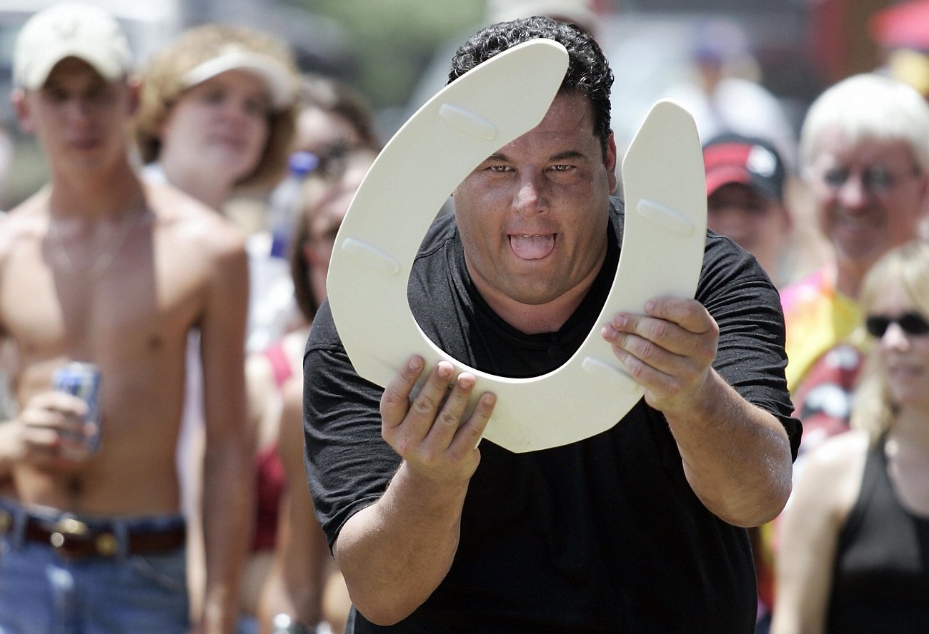 Schirripa holding a toilet seat