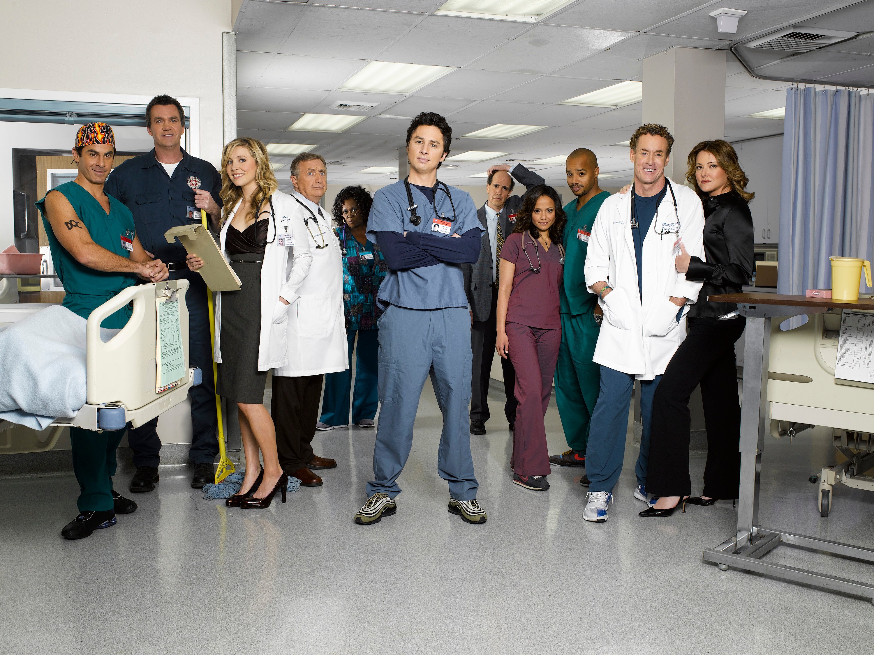 (L-R) Rob Maschio, Neil Flynn, Sarah Chalke, Ken Jenkins, Aloma Wright, Zach Braff, Sam Lloyd, Donald Faison, Judy Reyes, John C. McGinley, and Christa Miller in 'Scrubs'