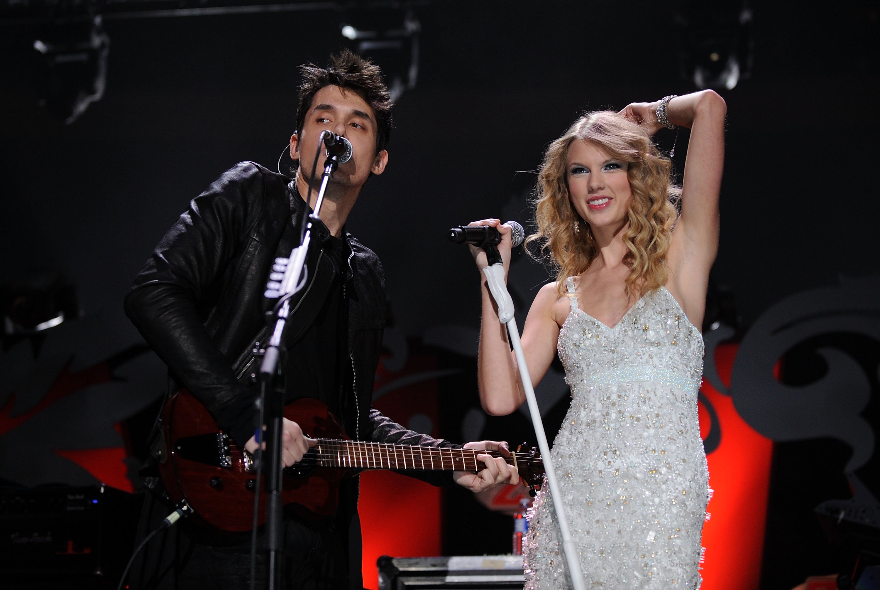 John Mayer and Taylor Swift perform onstage during Z100's Jingle Ball on December 11, 2009 in New York City.