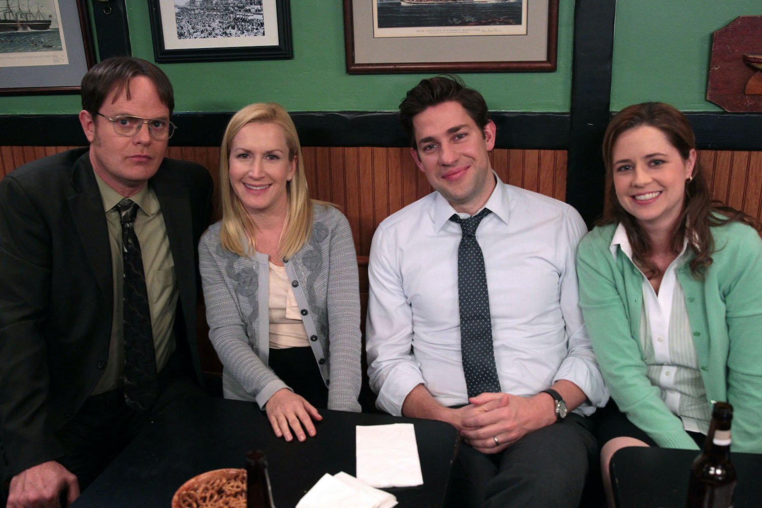 Rainn Wilson, Angela Kinsey, John Krasinski, and Jenna Fischer in character on 'The Office'