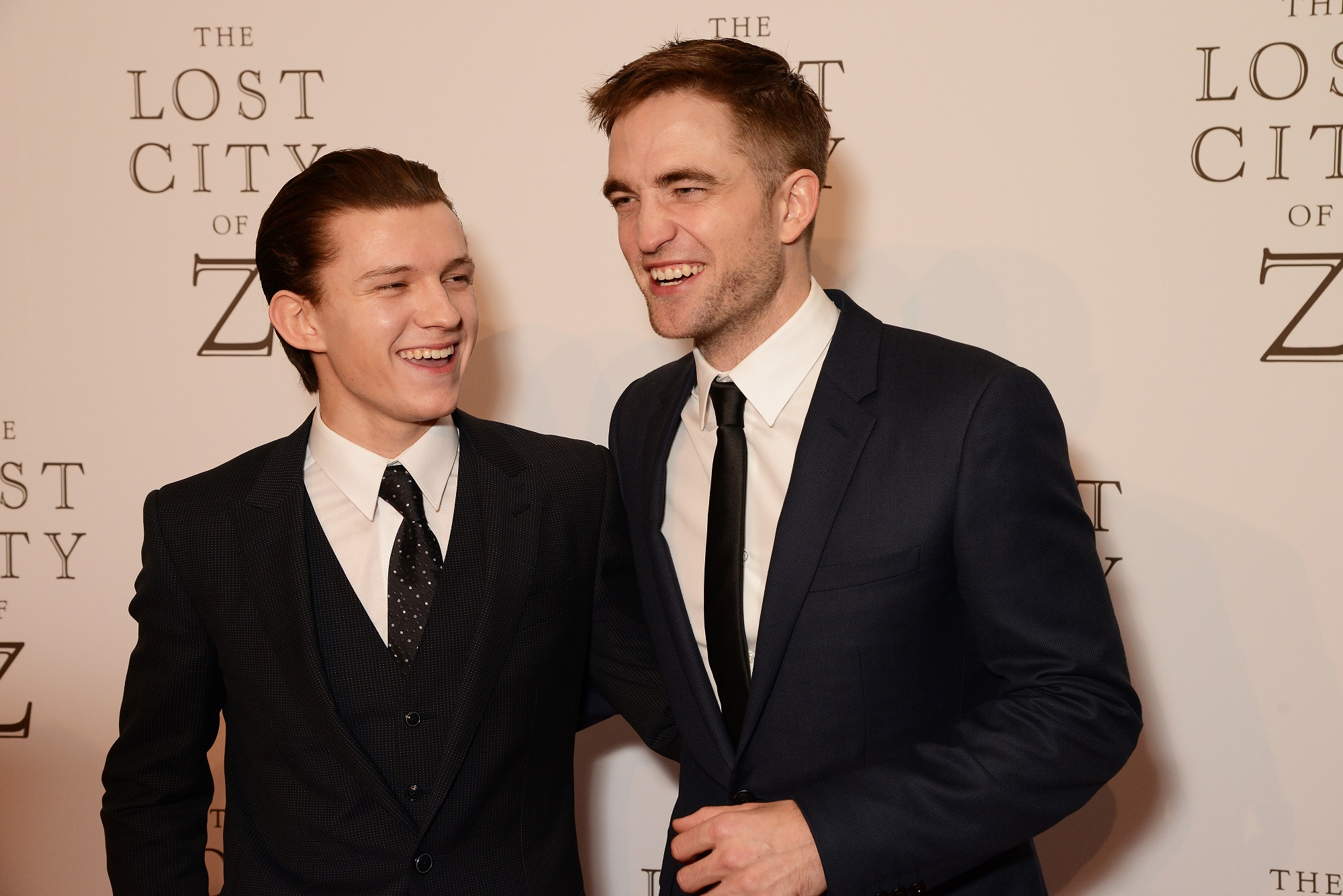 Tom Holland (L) and Robert Pattinson attend the UK premiere of 'The Lost City of Z' on February 16, 2017 in London, England. 