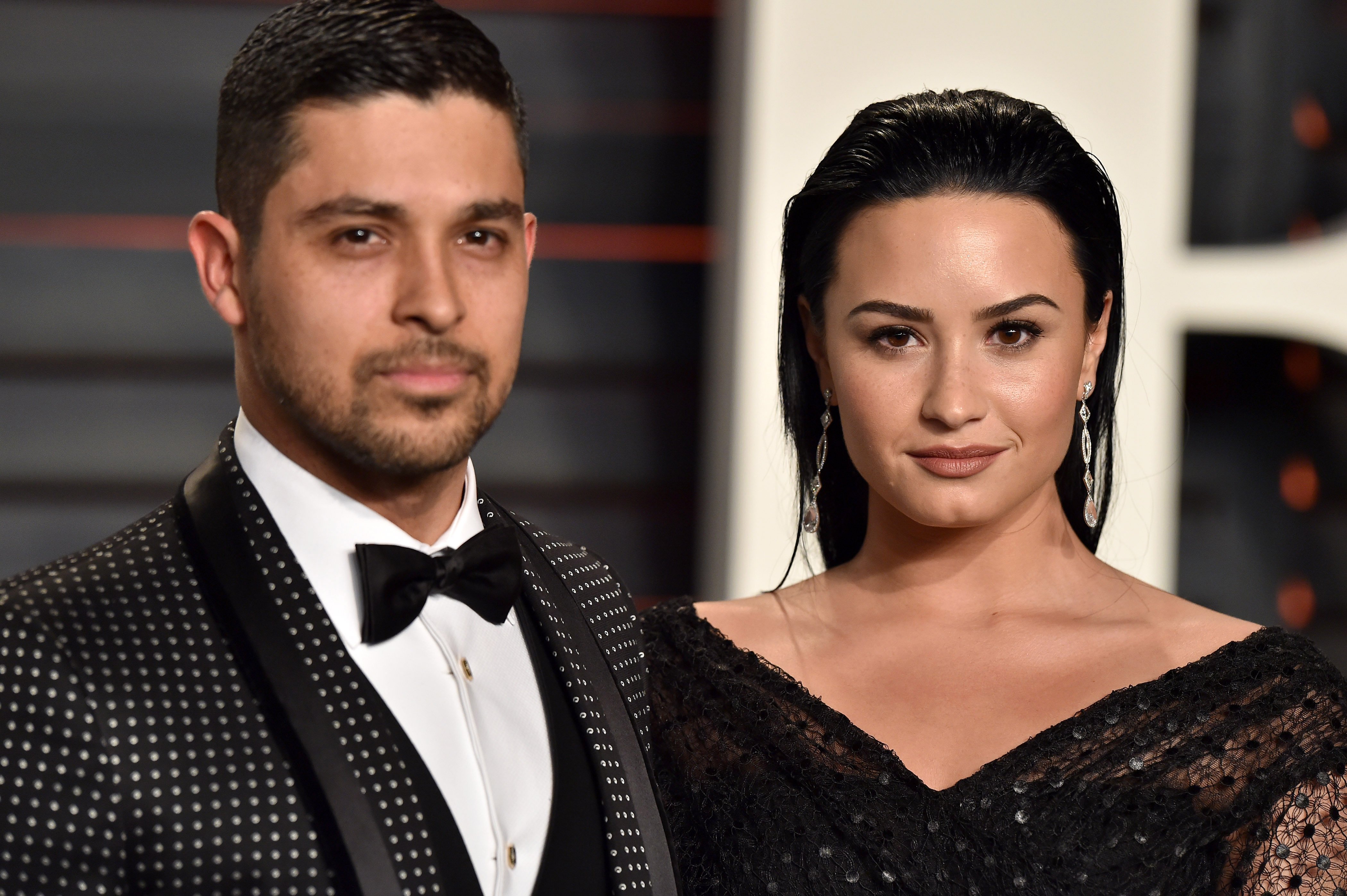 Wilmer Valderrama and Demi Lovato at the 2016 Vanity Fair Oscar Party on February 28, 2016 in Beverly Hills, California.