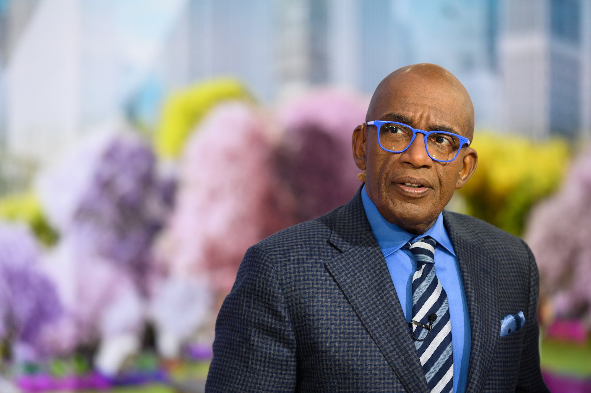 Al Roker looking off to the side in front of a blurred background