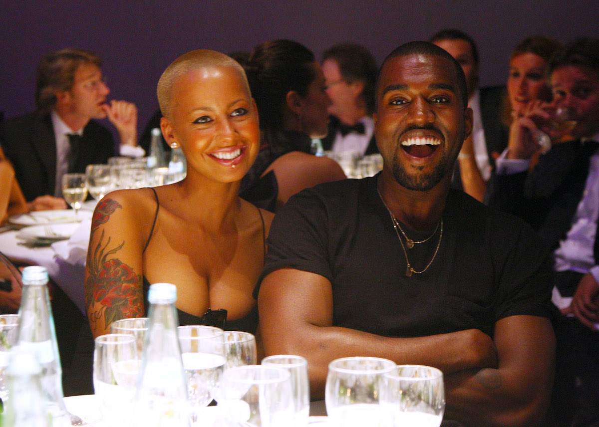 Amber Rose and Kanye West attend amfAR Milano 2009 Dinner, the Inaugural Milan Fashion Week event at La Permanente on September 28, 2009 in Milan, Italy.