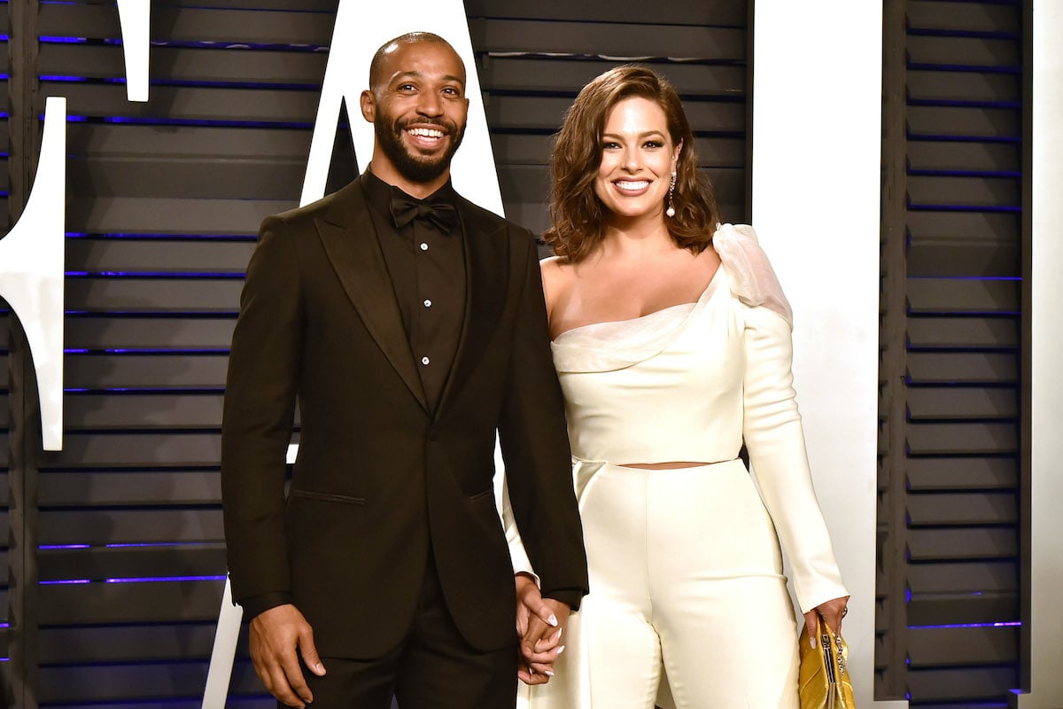 Justin Ervin and Ashley Graham attend the 2019 Vanity Fair Oscar Party at Wallis Annenberg Center for the Performing Arts on February 24, 2019 in Beverly Hills, California |  David Crotty/Patrick McMullan via Getty Images