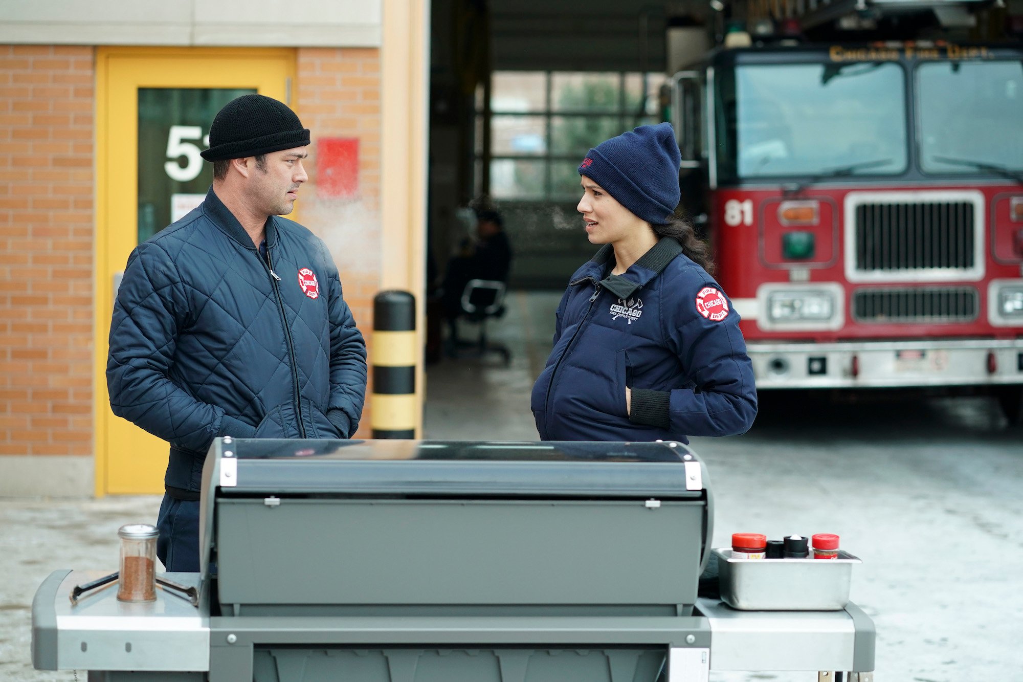 (L-R) Taylor Kinney as Kelly Severide, Miranda Rae Mayo as Stella Kidd looking at each other having a conversation