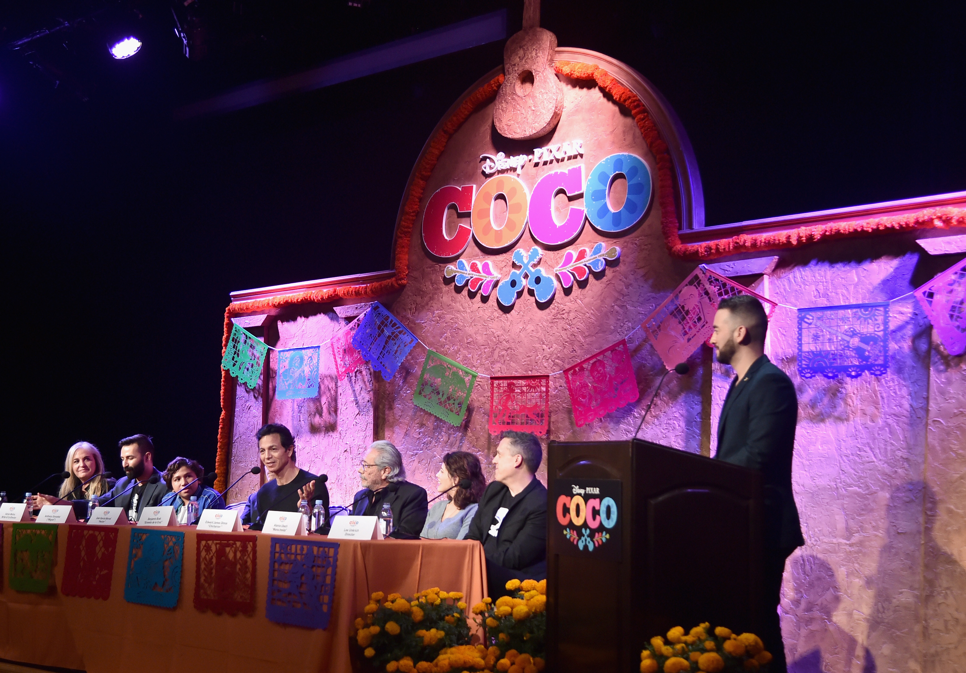 Producer Darla K. Anderson, Co-Director/screenwriter Adrian Molina, actors Anthony Gonzalez, Benjamin Bratt, Edward James Olmos, Alanna Ubach, Director Lee Unkrich and moderator Francisco Caceres at the Global Press Conference for Disney-Pixar's 'Coco'
