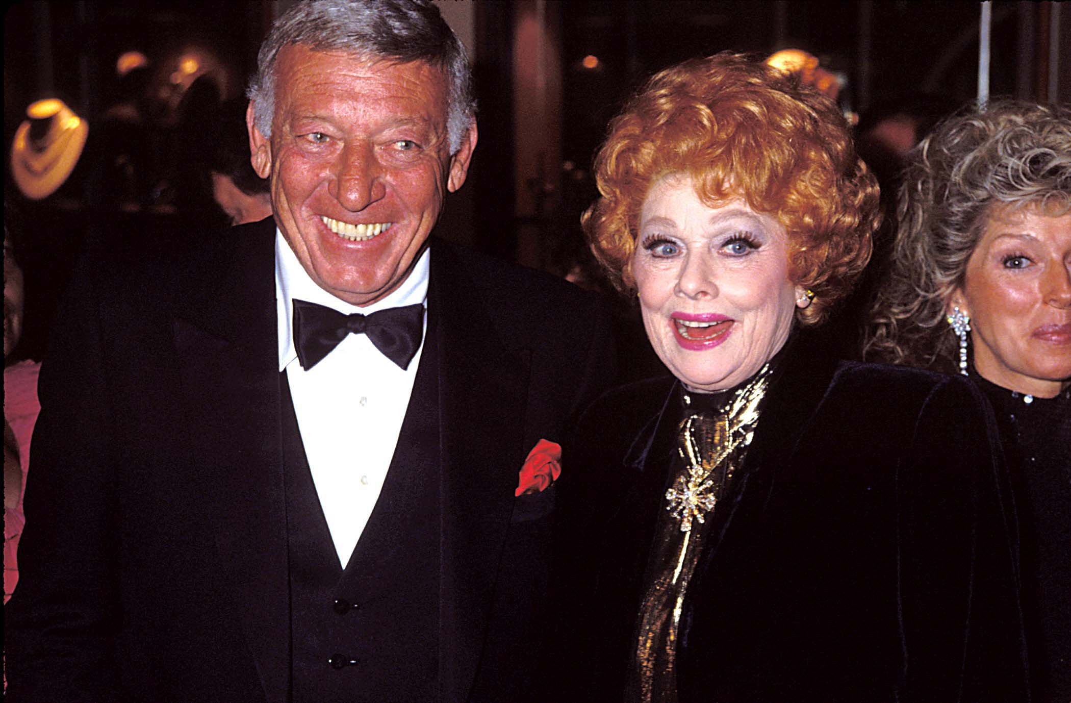 Lucille Ball with husband Gary Morton, left