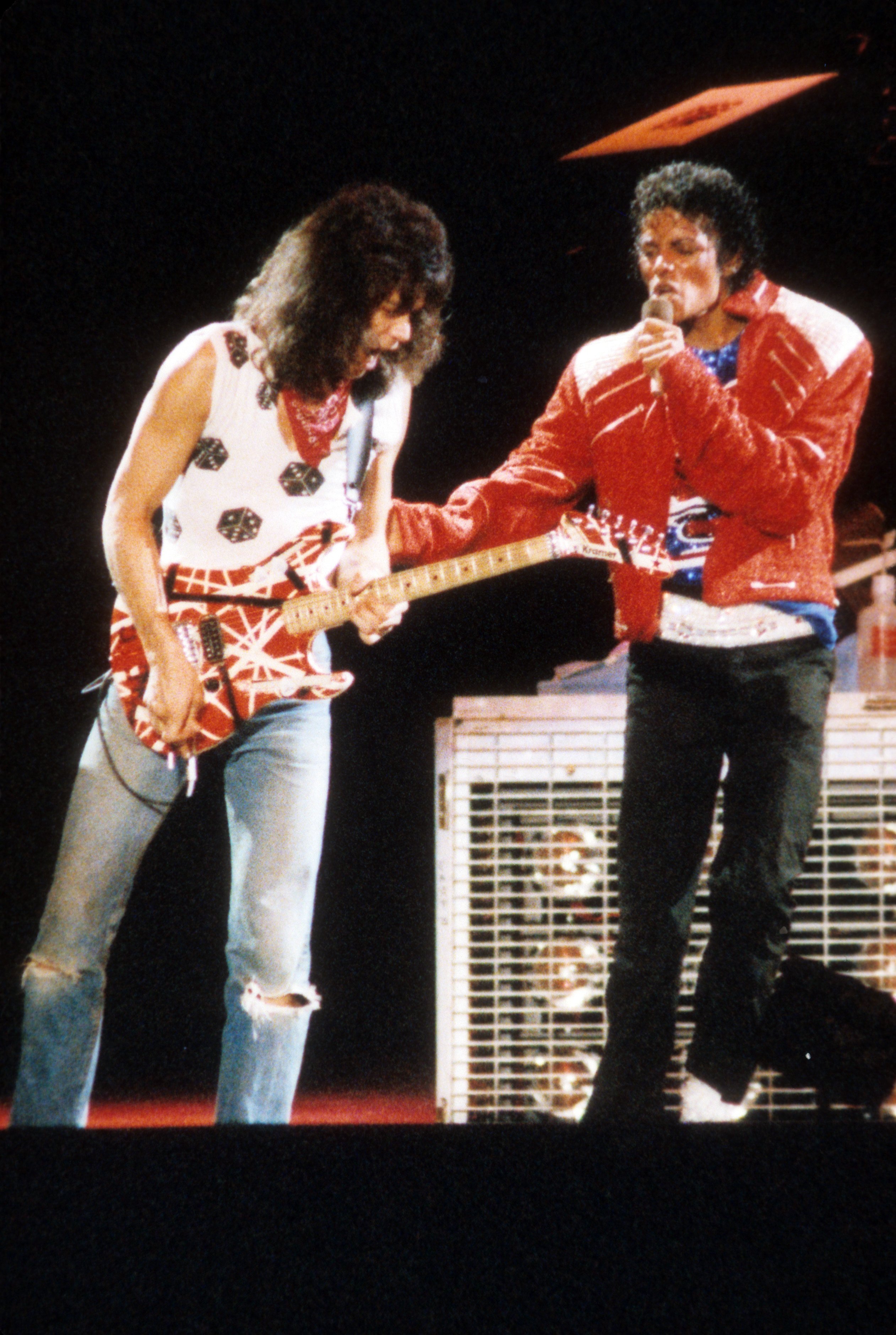 Eddie Van Halen, left, performing "Beat It" with Michael Jackson in 1984