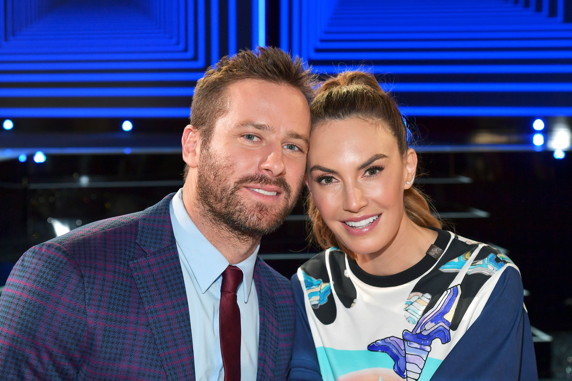 Armie Hammer and Elizabeth Chambers pose during the 2019 Independent Spirit Awards