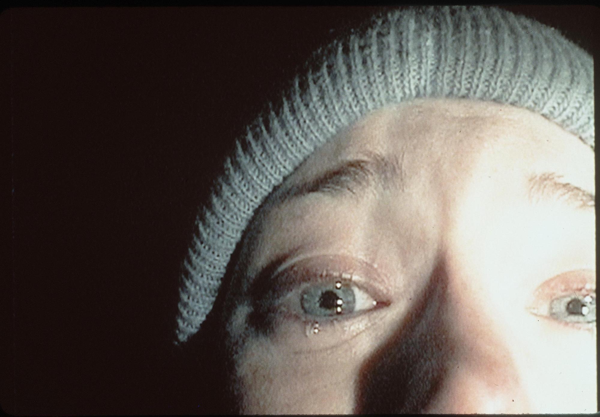 Heather Donahue close up and crying in 'The Blair Witch Project'