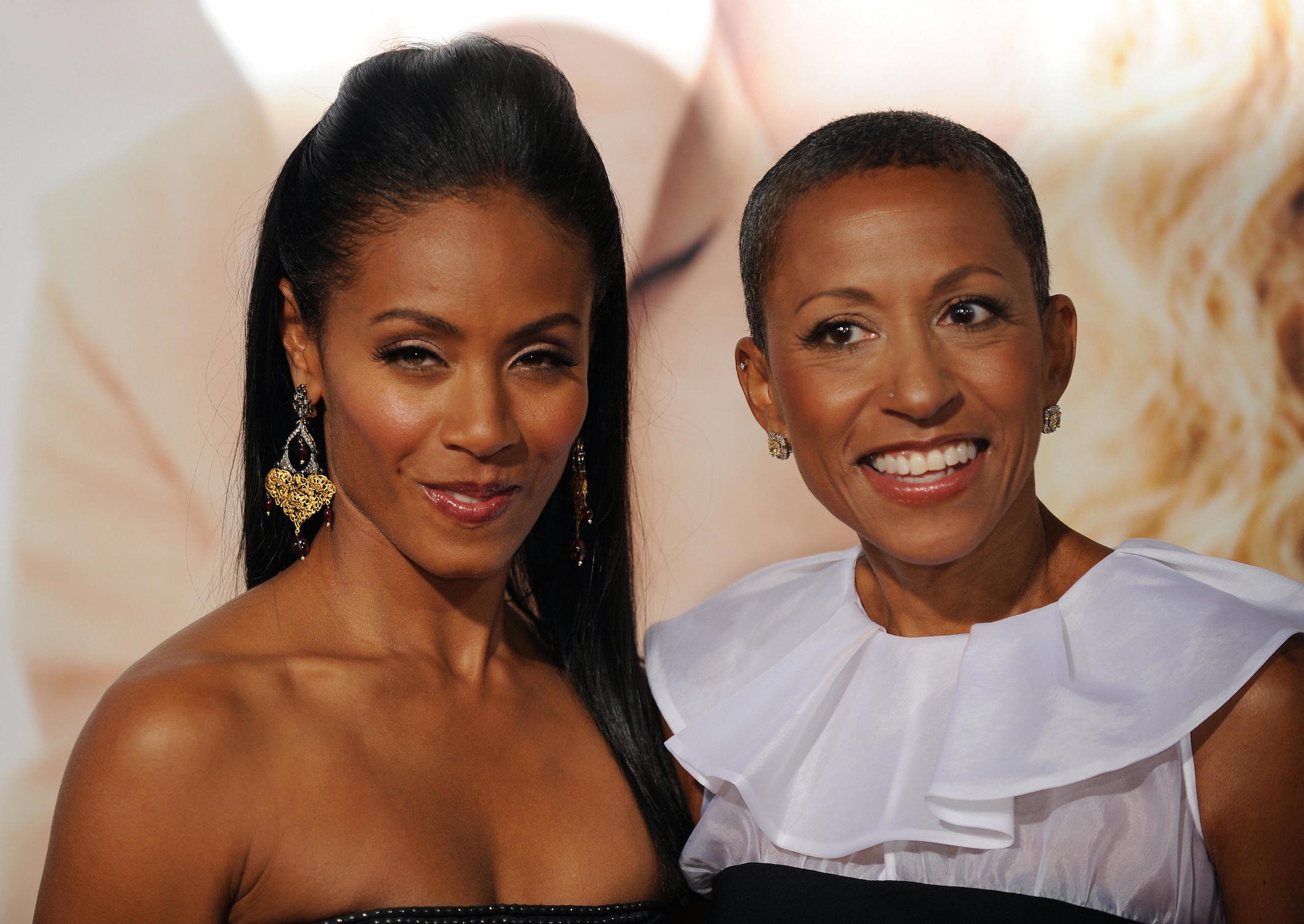 Actress Jada Pinkett Smith arrives with her mother, Adrienne Banfield (R) at the premiere of 'The Women'