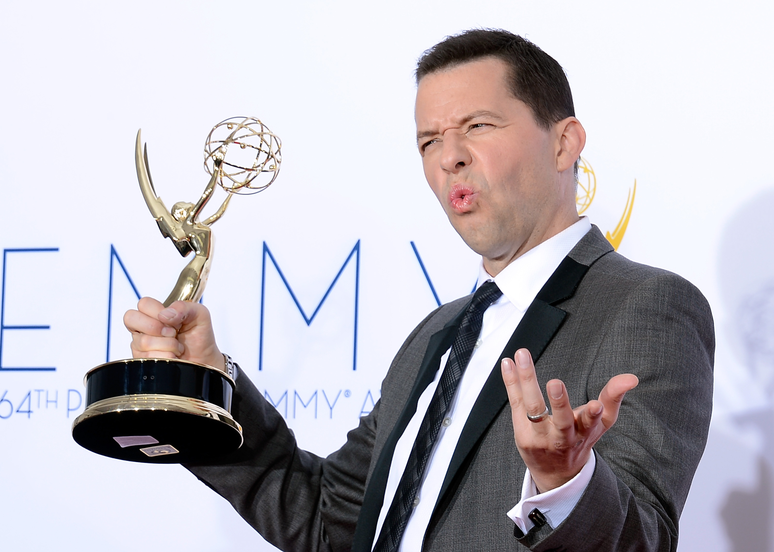 Jon Cryer poses in the press room during the 64th Annual Primetime Emmy Awards at Nokia Theatre