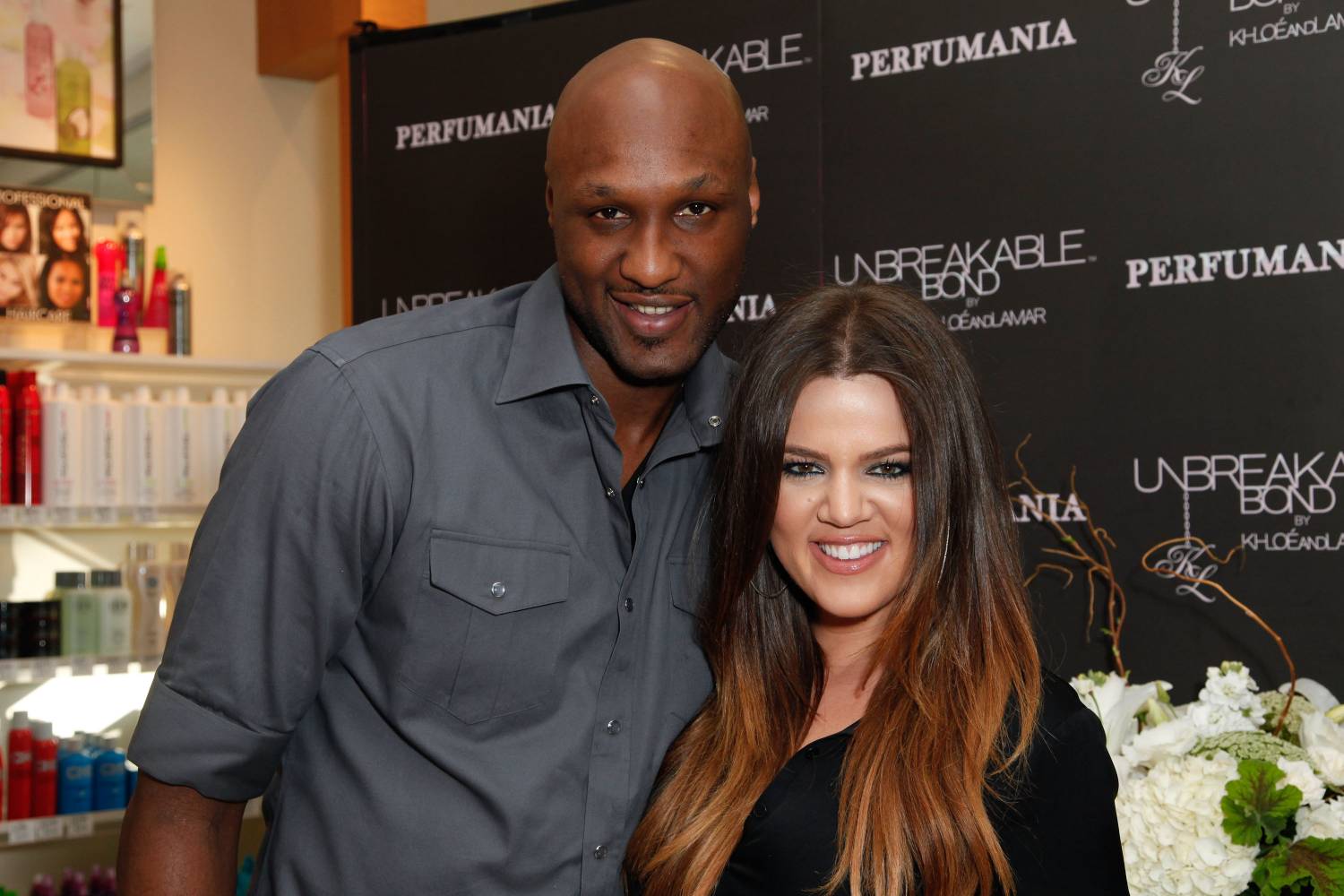 Professional basketball player Lamar Odom and TV personality Khloe Kardashian make an appearance to promote their fragrance, 'Unbreakable Bond,' at Perfumania on June 7, 2012 in Orange, California.
