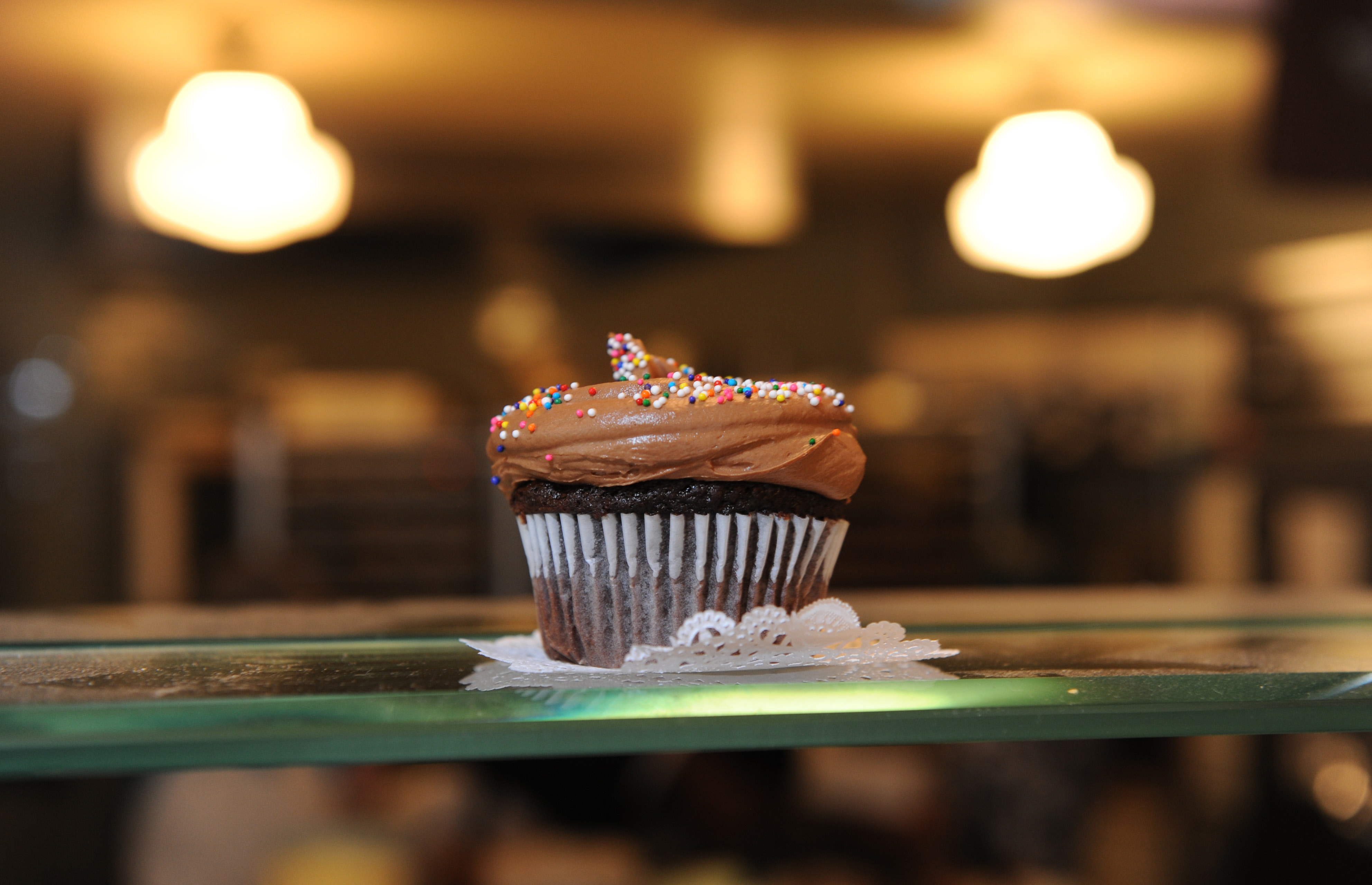 A cupcake on display at the Magnolia Bakery F