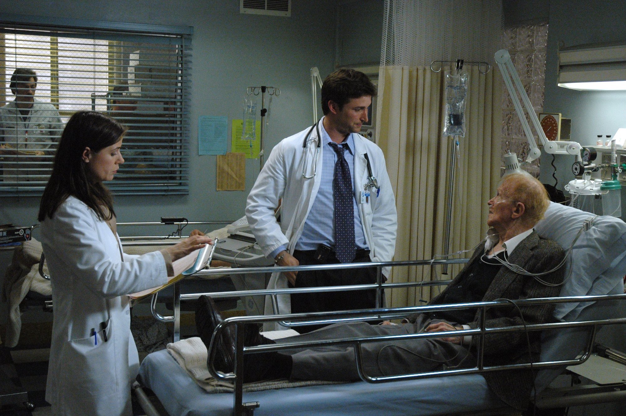 Maura Tierney as Doctor Abby Lockhart, Noah Wyle as Doctor John Carter, Red Buttons as Jules 'Ruby' Rubadoux
