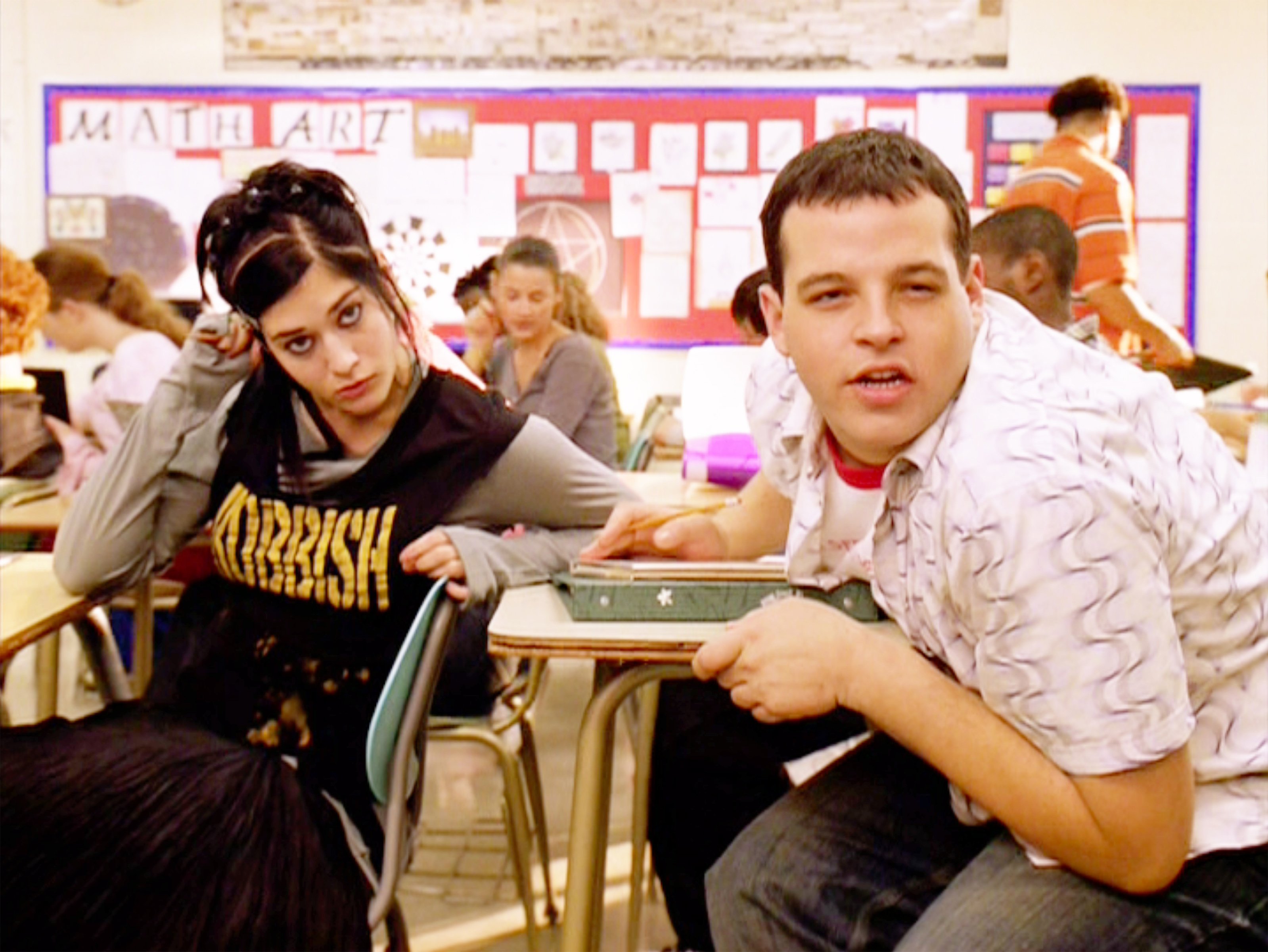 Lizzy Caplan as Janis Ian and Daniel Franzese as Damian in 'Mean Girls'