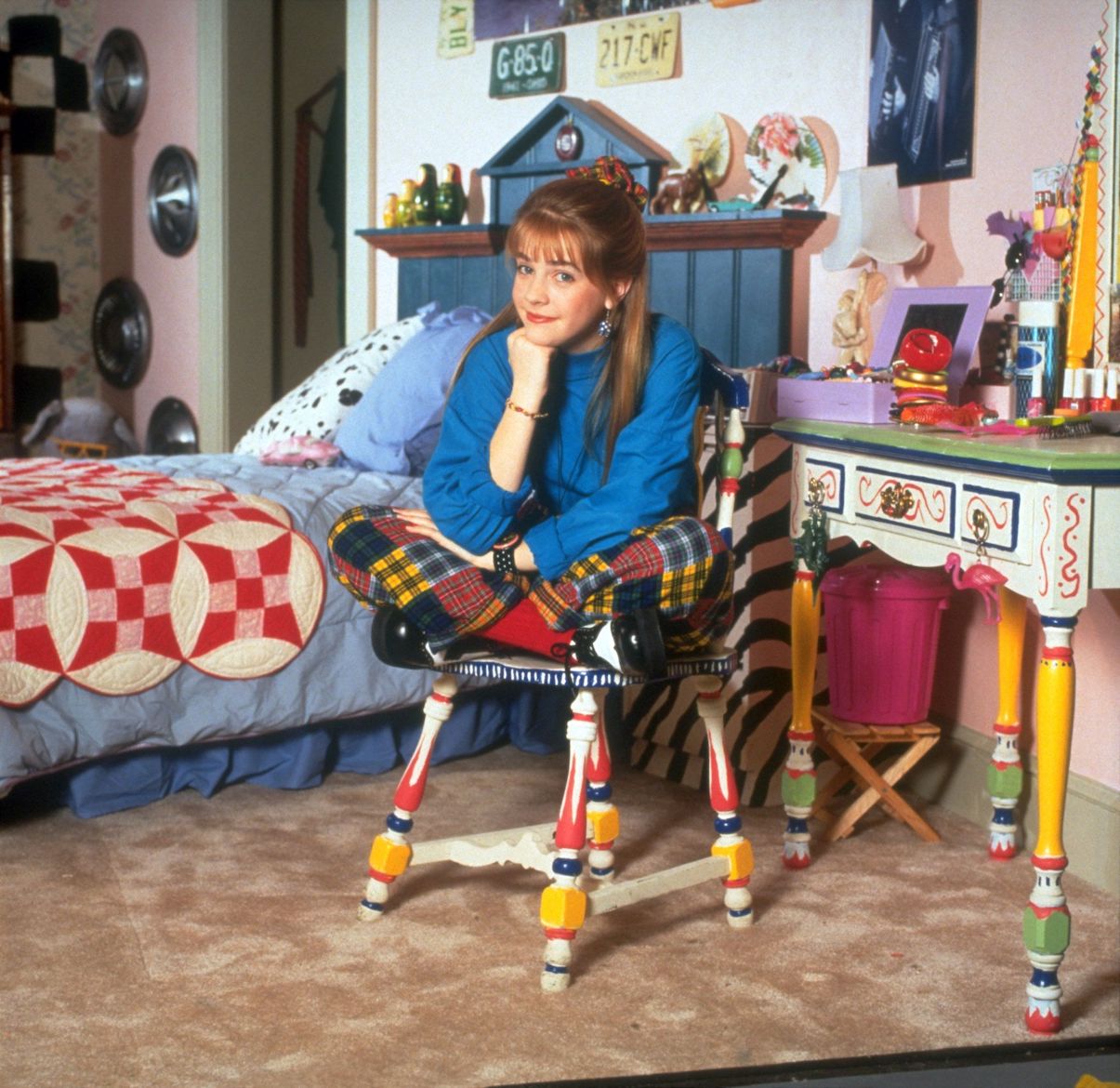 Melissa Joan Hart sits on a chair in Clarissa Darling's bedroom on 'Clarissa Explains It All'