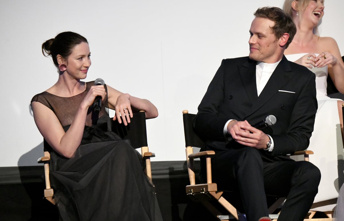 Outlander Caitriona Balfe and Sam Heughan speak onstage during the Starz Premiere event for season 5 at Hollywood Palladium on February 13, 2020 in Los Angeles, California.