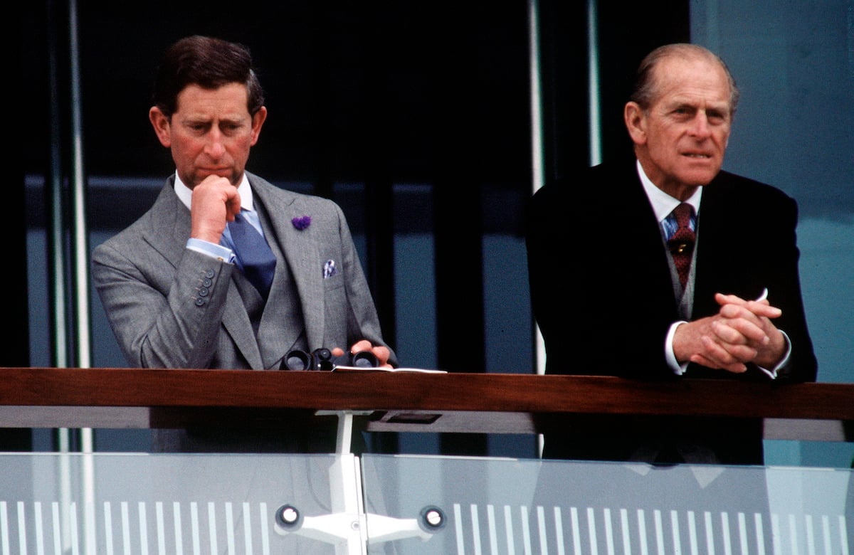 Prince Philip [duke Of Edinburgh] And Prince Charles [prince Of Wales] Together On The Balcony Watching The Racing At The Derby Held At Epsom In Surrey