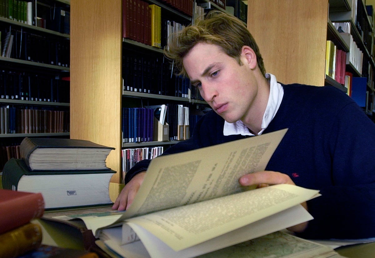 Prince William studies in the library at the University of St. Andrews