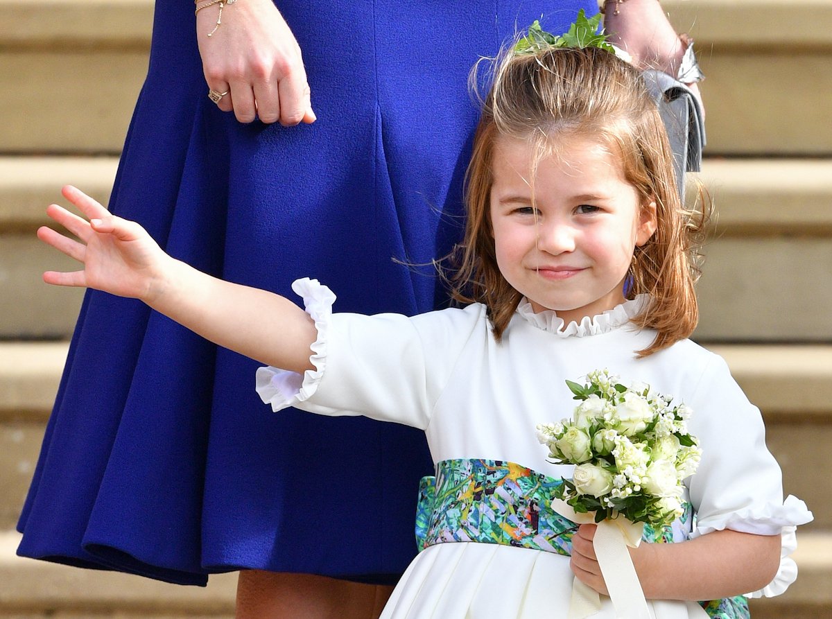 Princess Charlotte of Cambridge attends the wedding of Princess Eugenie of York and Jack Brooksbank at St George's Chapel on October 12, 2018 in Windsor, England 