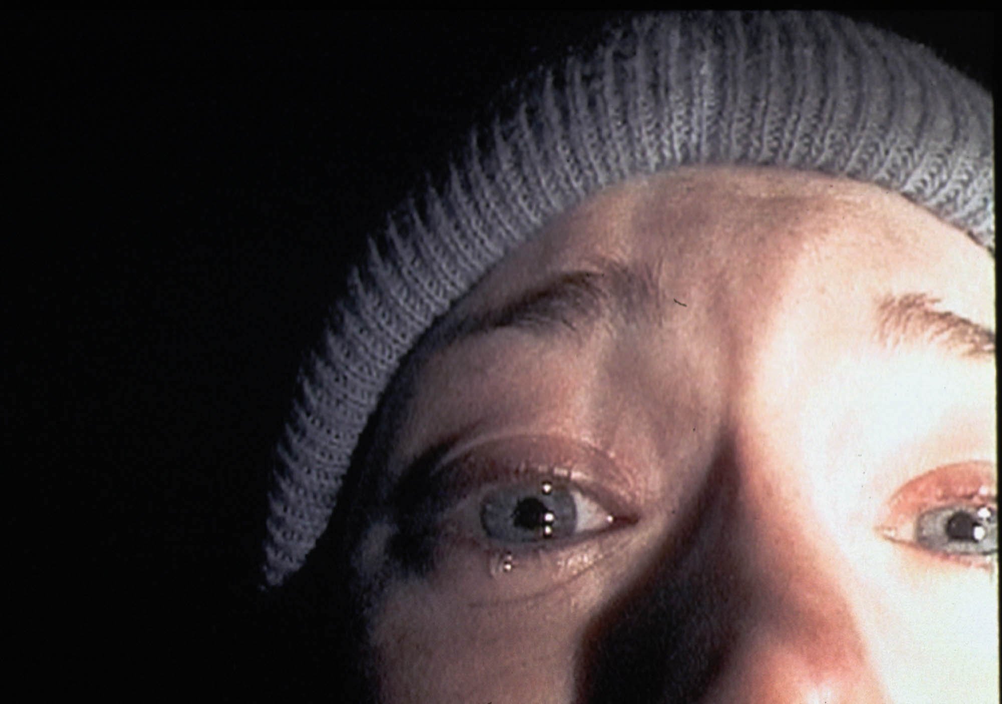 Heather Donahue close up and crying in 'The Blair Witch Project'