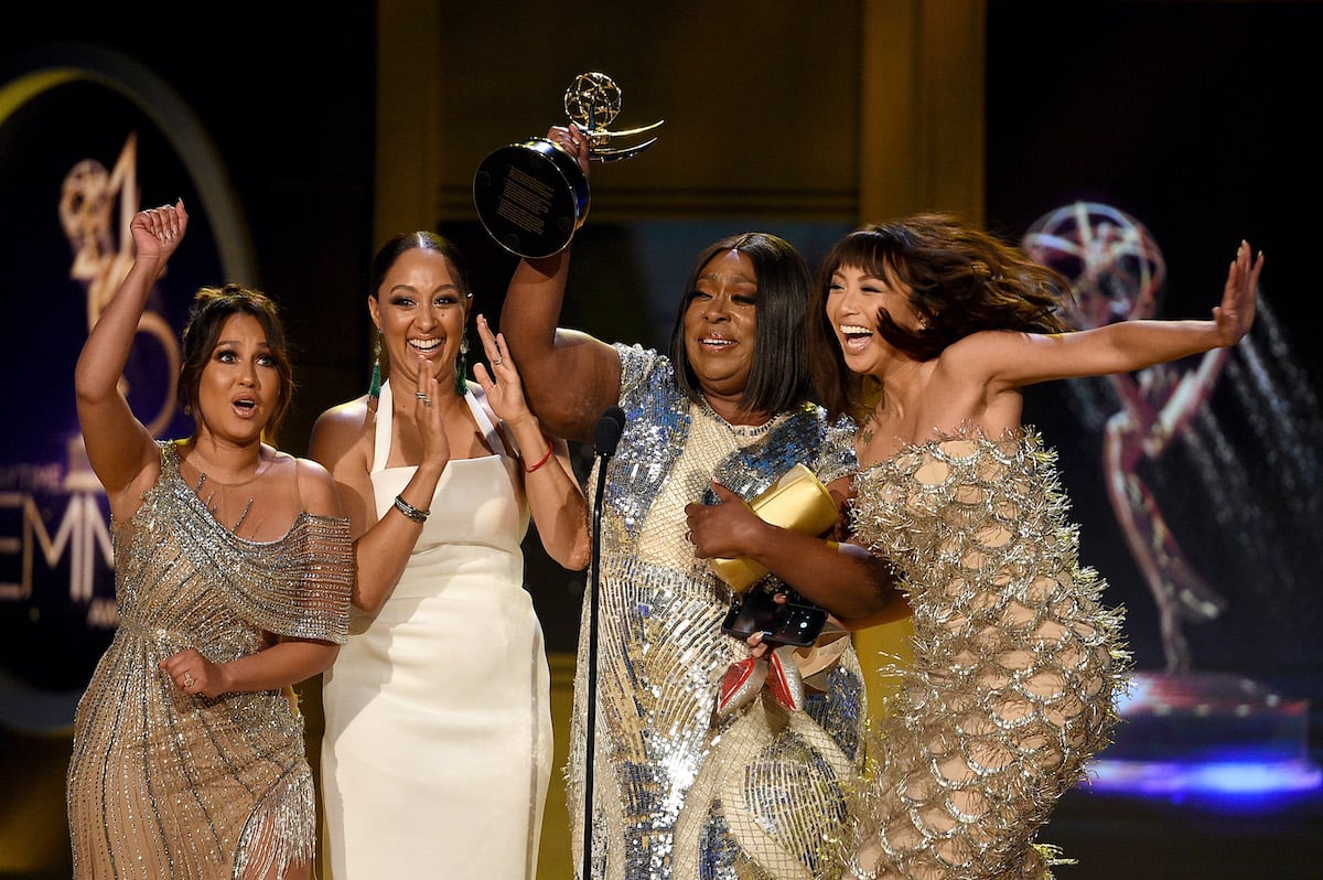 (L-R) Adrienne Bailon, Tamera Mowry-Housley, Loni Love, and Jeannie Mai, winners of Outstanding Entertainment Talk Show Host for The Real, accept award onstage during the 45th annual Daytime Emmy Awards