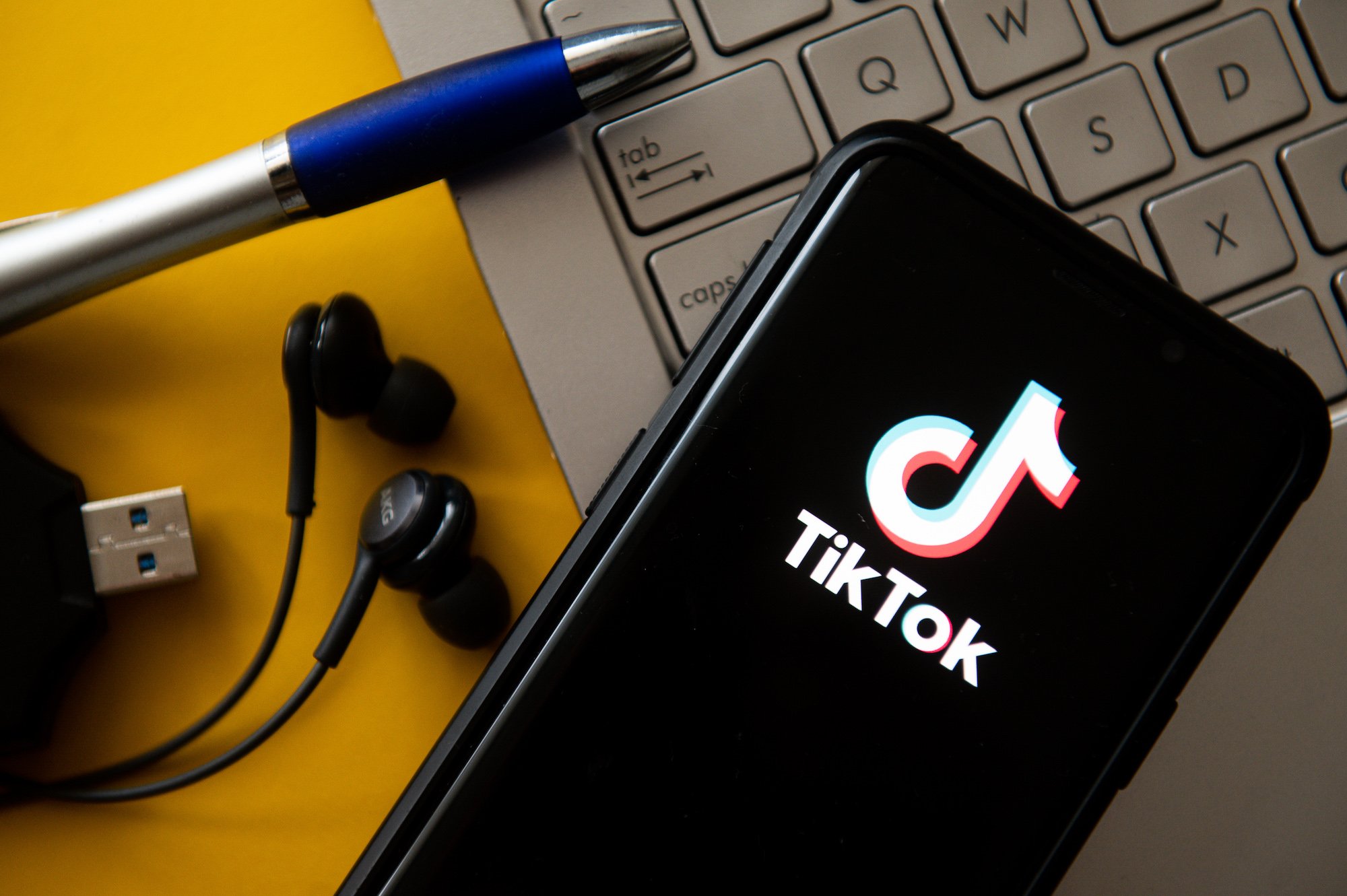 In this photo illustration a TikTok logo seen displayed on a smartphone