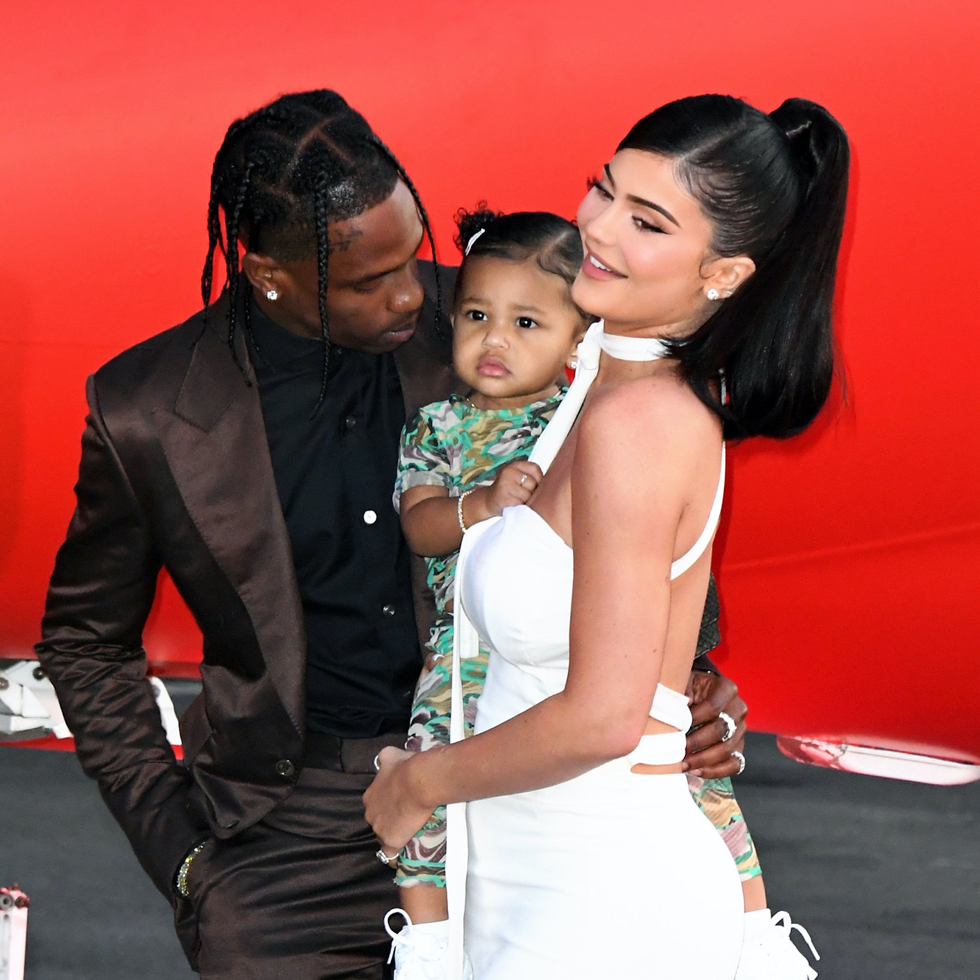 Travis Scott, Stormi Webster, and Kylie Jenner