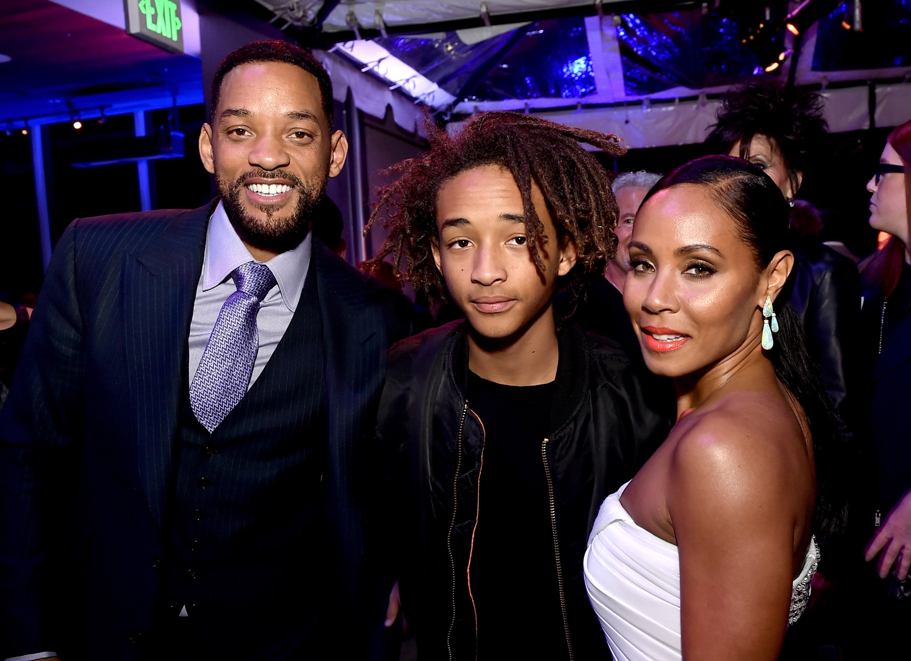 (L-R) Actors Will Smith, son Jaden Smith and his wife Jada Pinkett Smith pose at the after party for the premiere of Warner Bros. Pictures' "Focus" at the W Hotel on February 24, 2015 in Los Angeles, California.