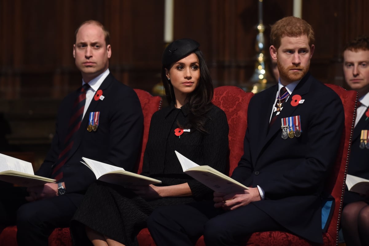 Prince William with Prince Harry and Meghan Markle