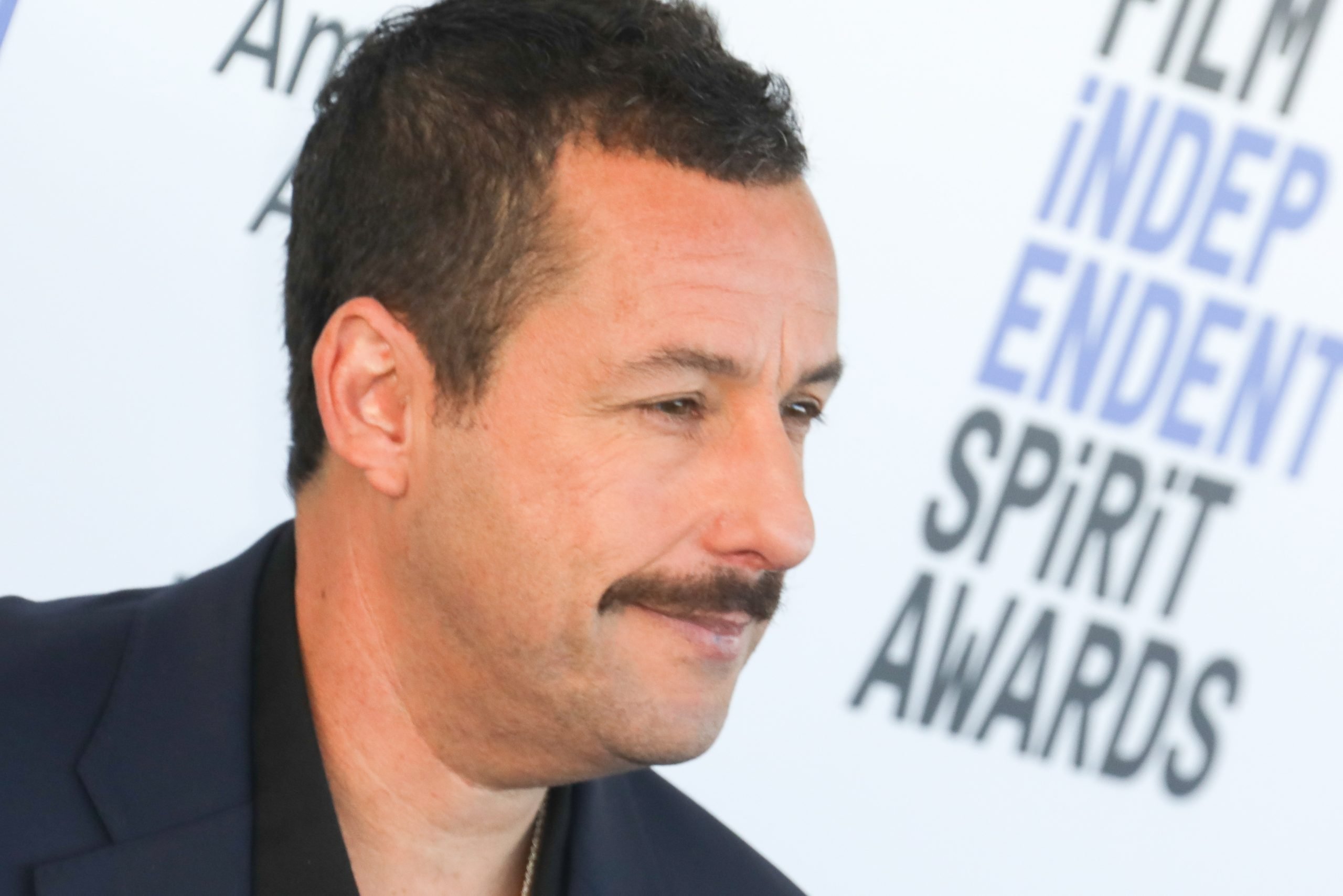 Adam Sandler Reveals a Fan Once Made Him Autograph a Bag of His Own