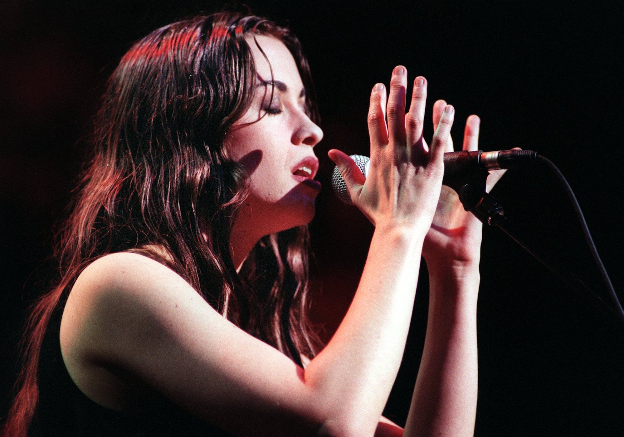 Alanis Morissette performing on stage during the KROQ 6th annual Almost Acoustic Christmas Concert on Dec. 18, 1995.