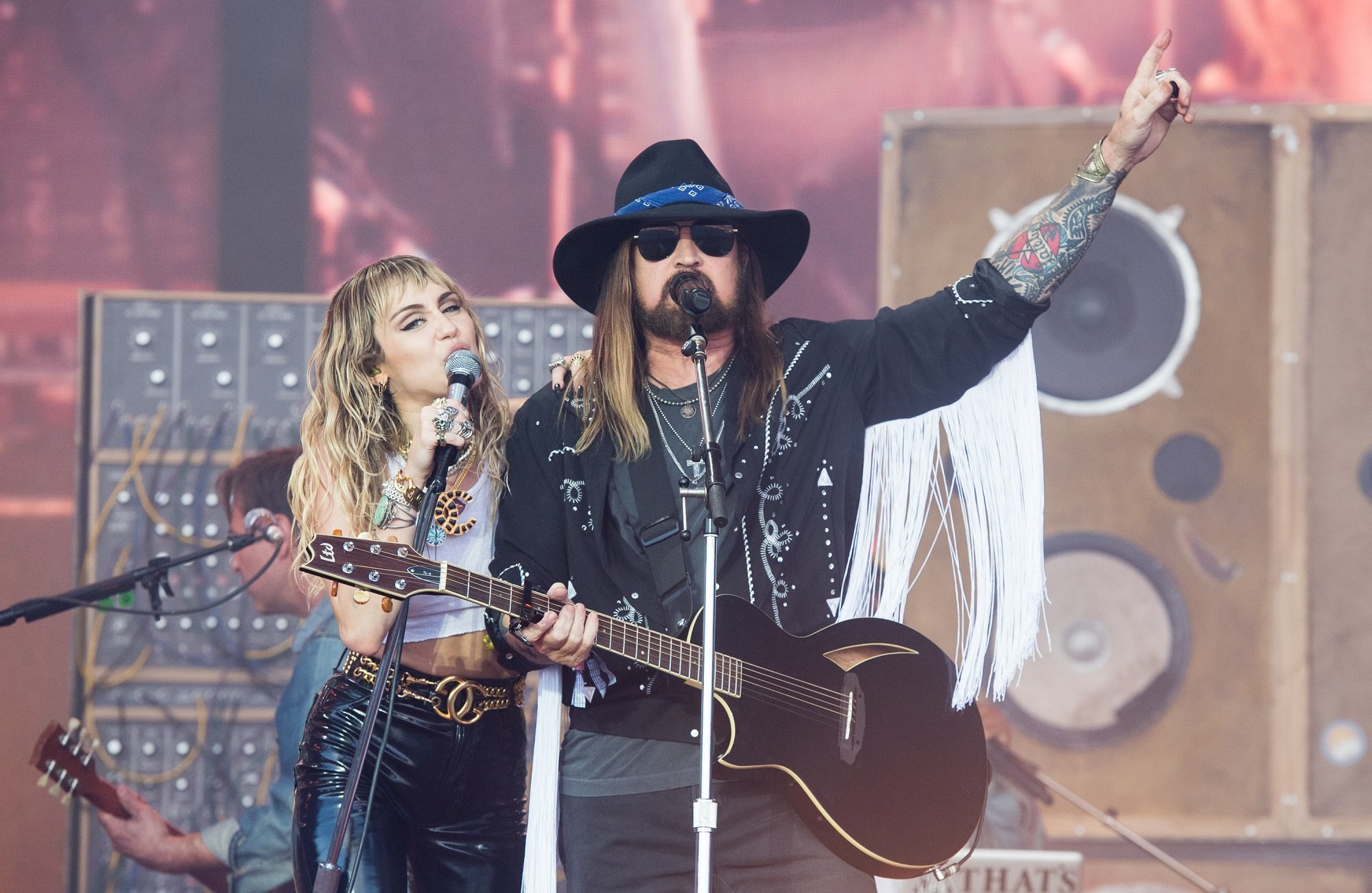 Miley Cyrus and Billy Ray Cyrus perform during Glastonbury Festival on June 30, 2019