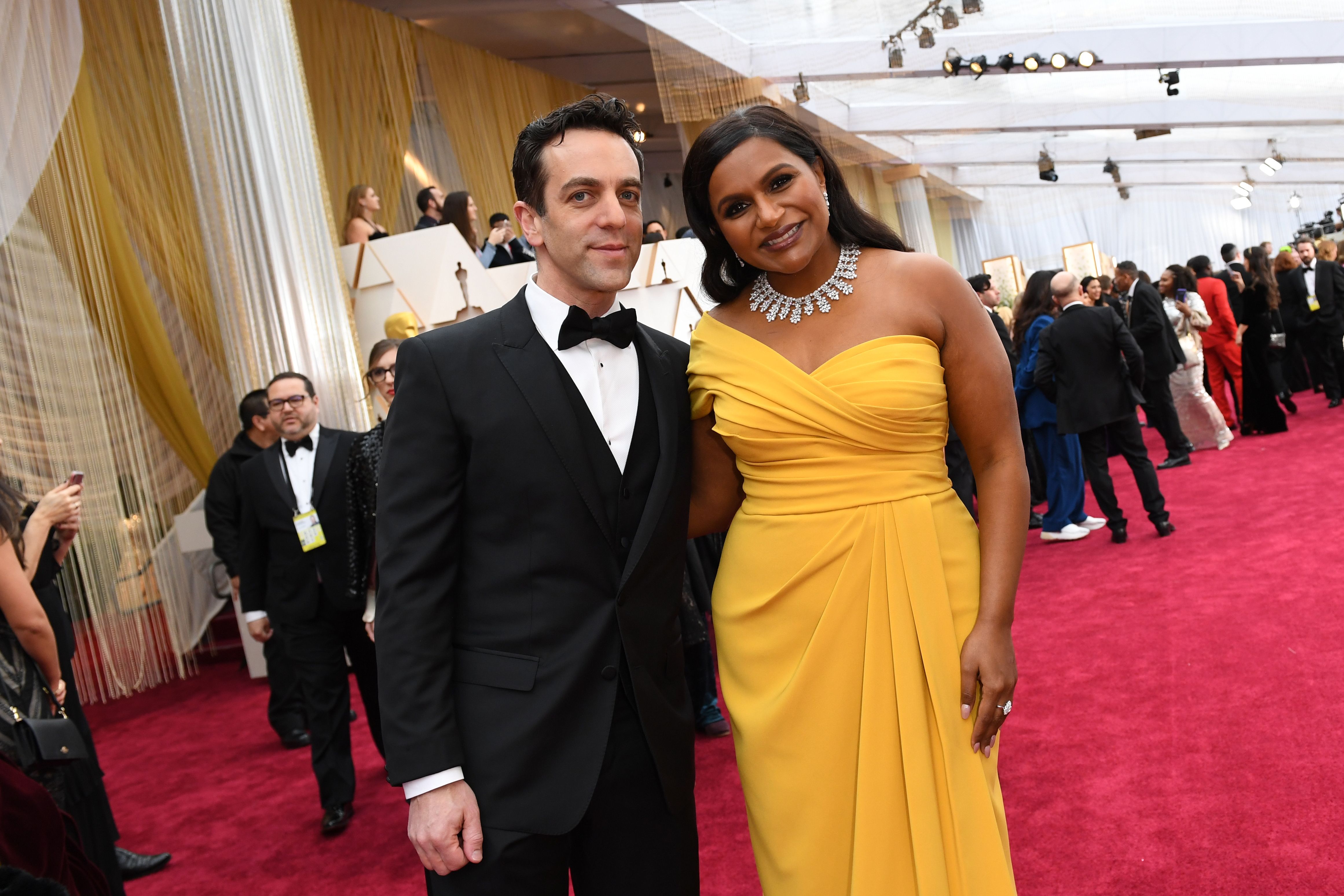 Mindy Kaling (R) and BJ Novak arrive for the 92nd Oscars on February 9, 2020.