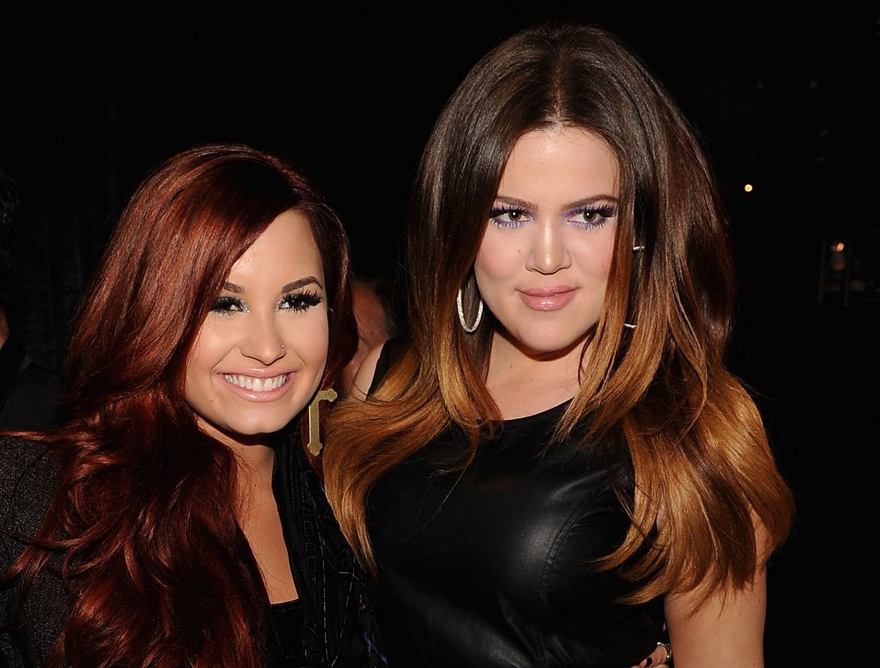 (L-R) Demi Lovato and Khloe Kardashian pose backstage at Z100's Jingle Ball 2011, presented by Aeropostale, at Madison Square Garden on December 9, 2011 in New York City.